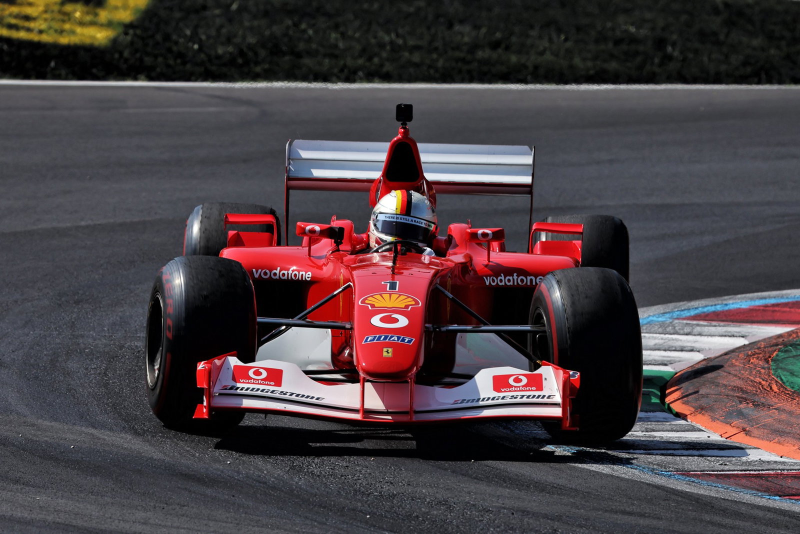 Sebastian Vettel drove Michael Schumacher's 2002 title-winning Ferrari at Monza
