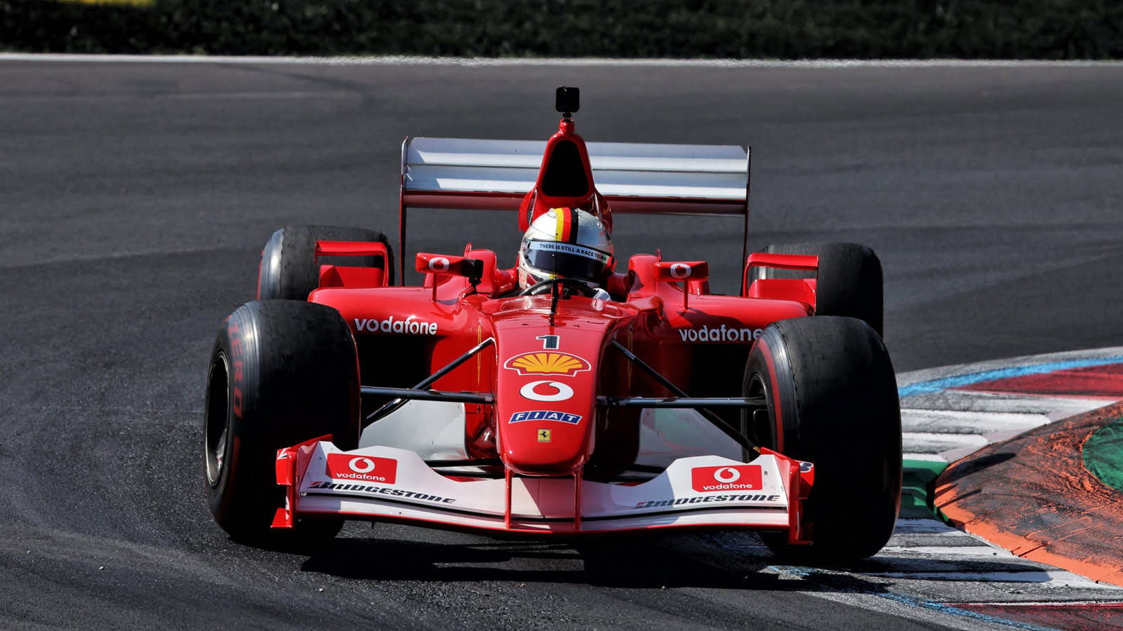 Sebastian Vettel drove Michael Schumacher's 2002 title-winning Ferrari at Monza