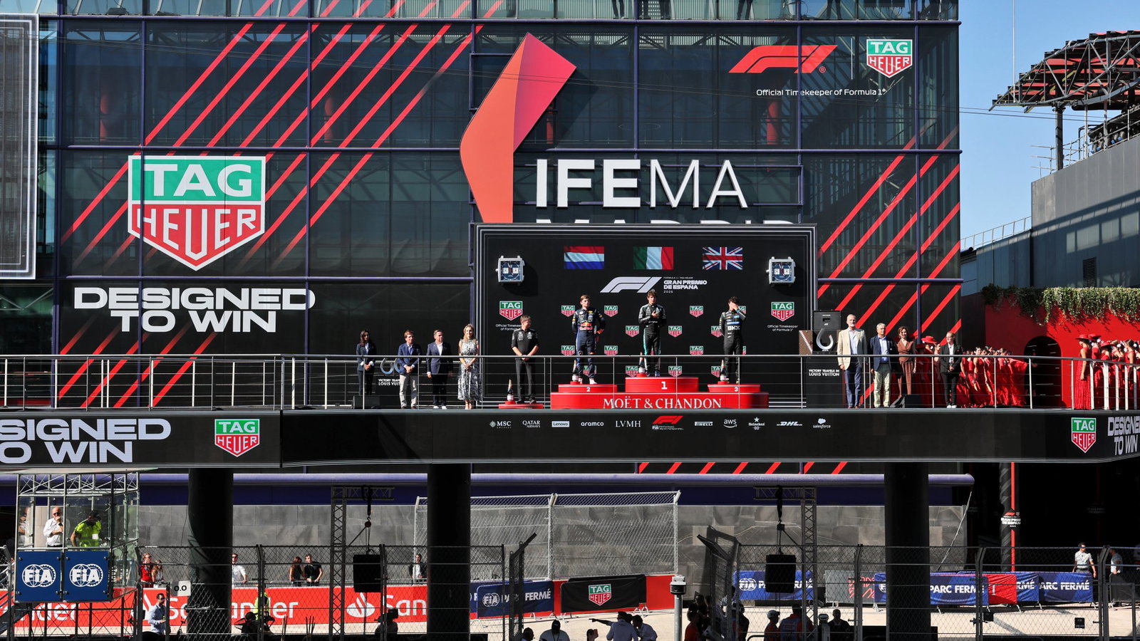 The photographer was trying to reach the F1 podium after the Spanish GP