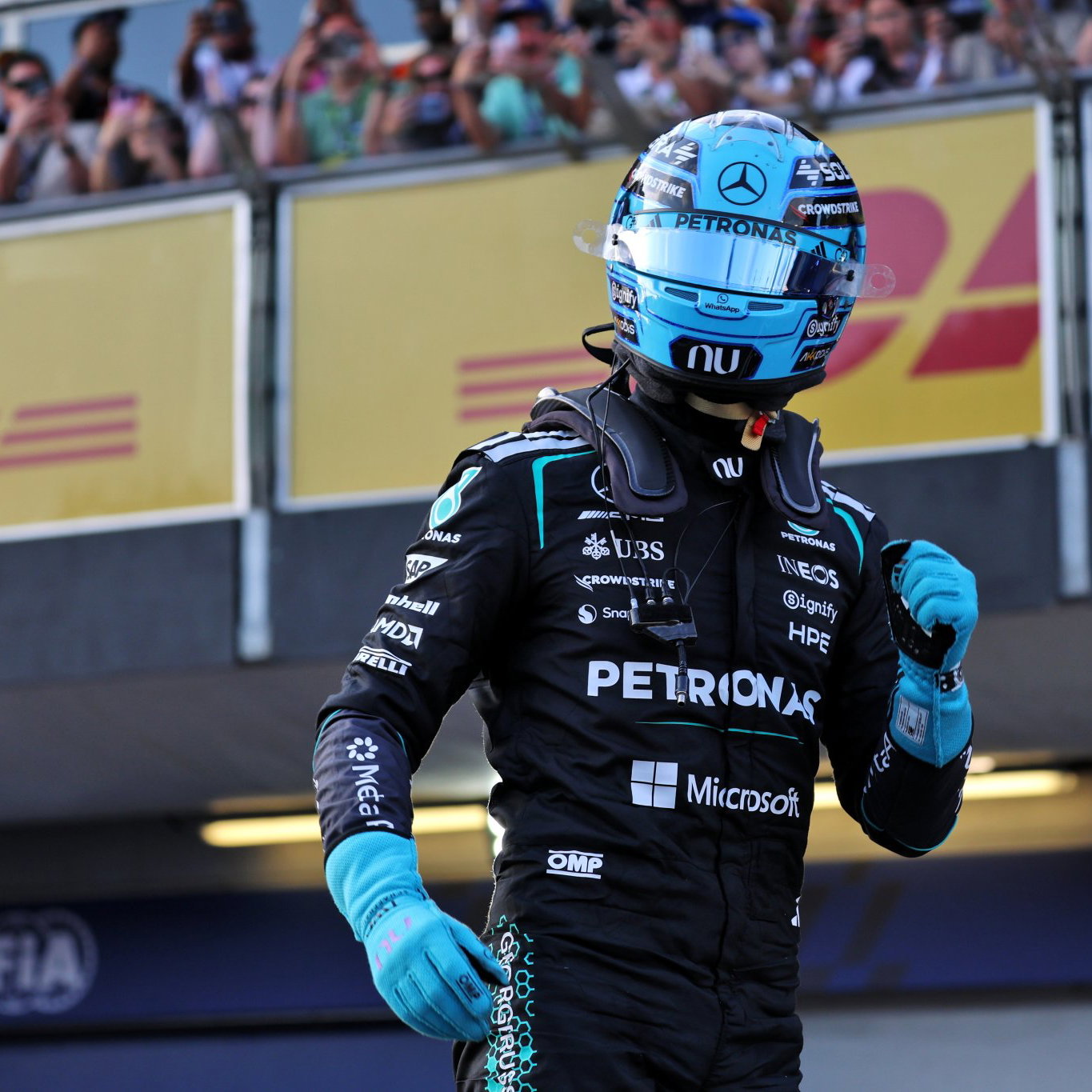 George Russell celebrates his fifth pole of 2026 