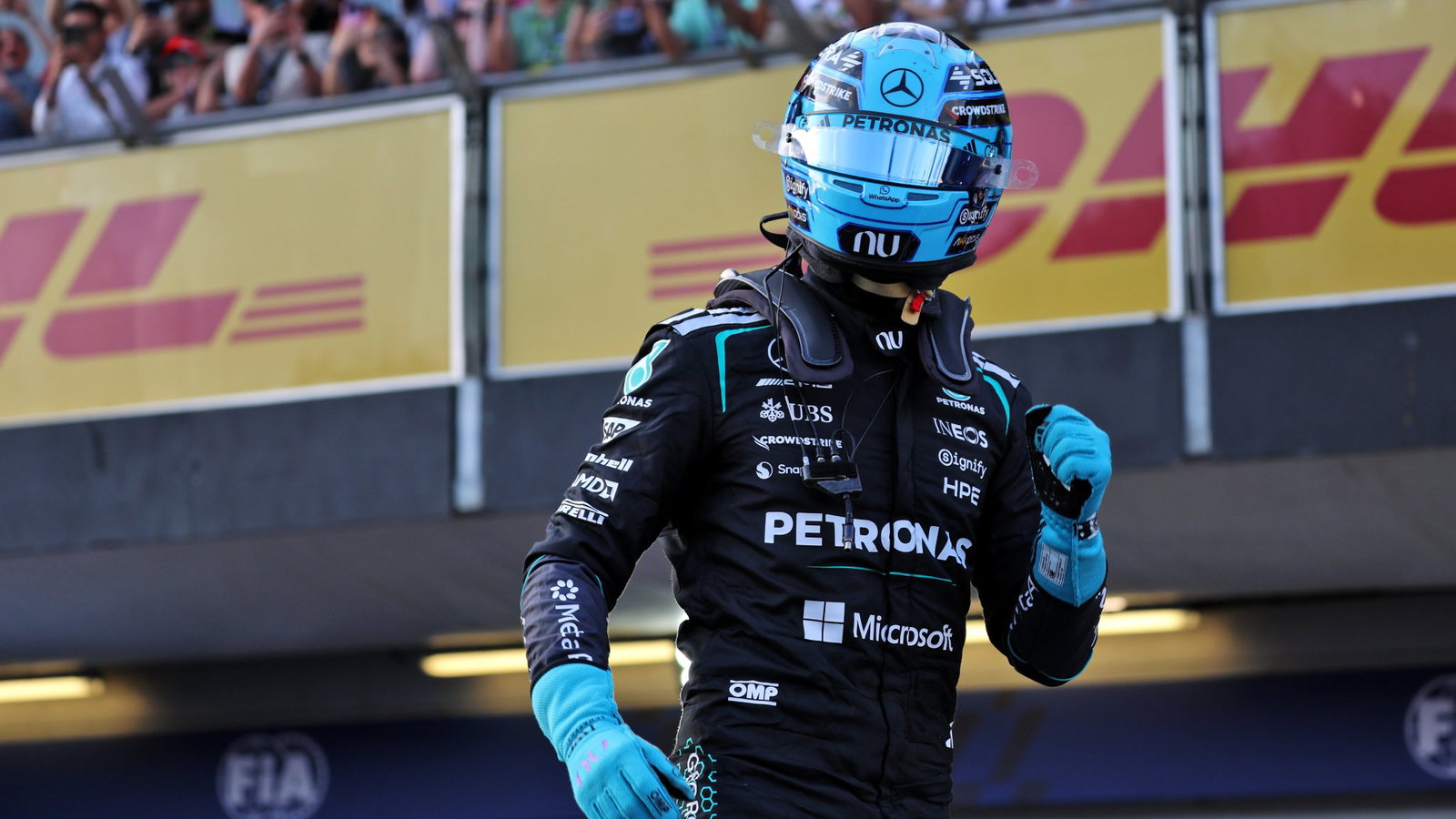 George Russell celebrates his fifth pole of 2026 