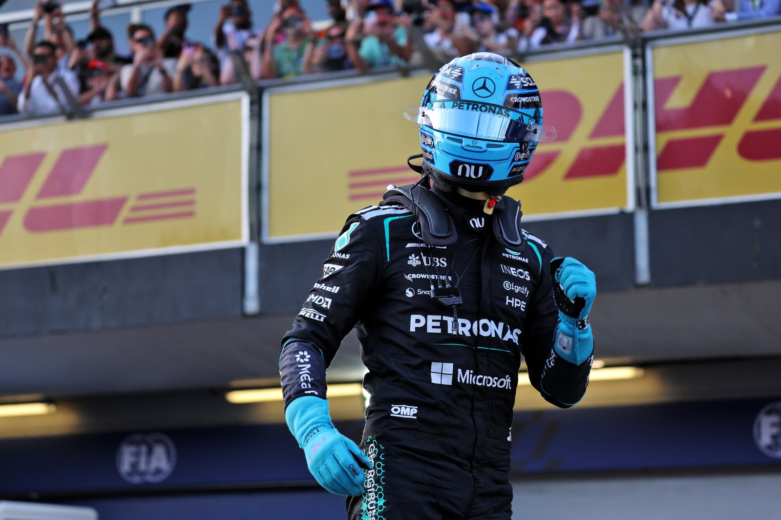 George Russell celebrates his fifth pole of 2026 