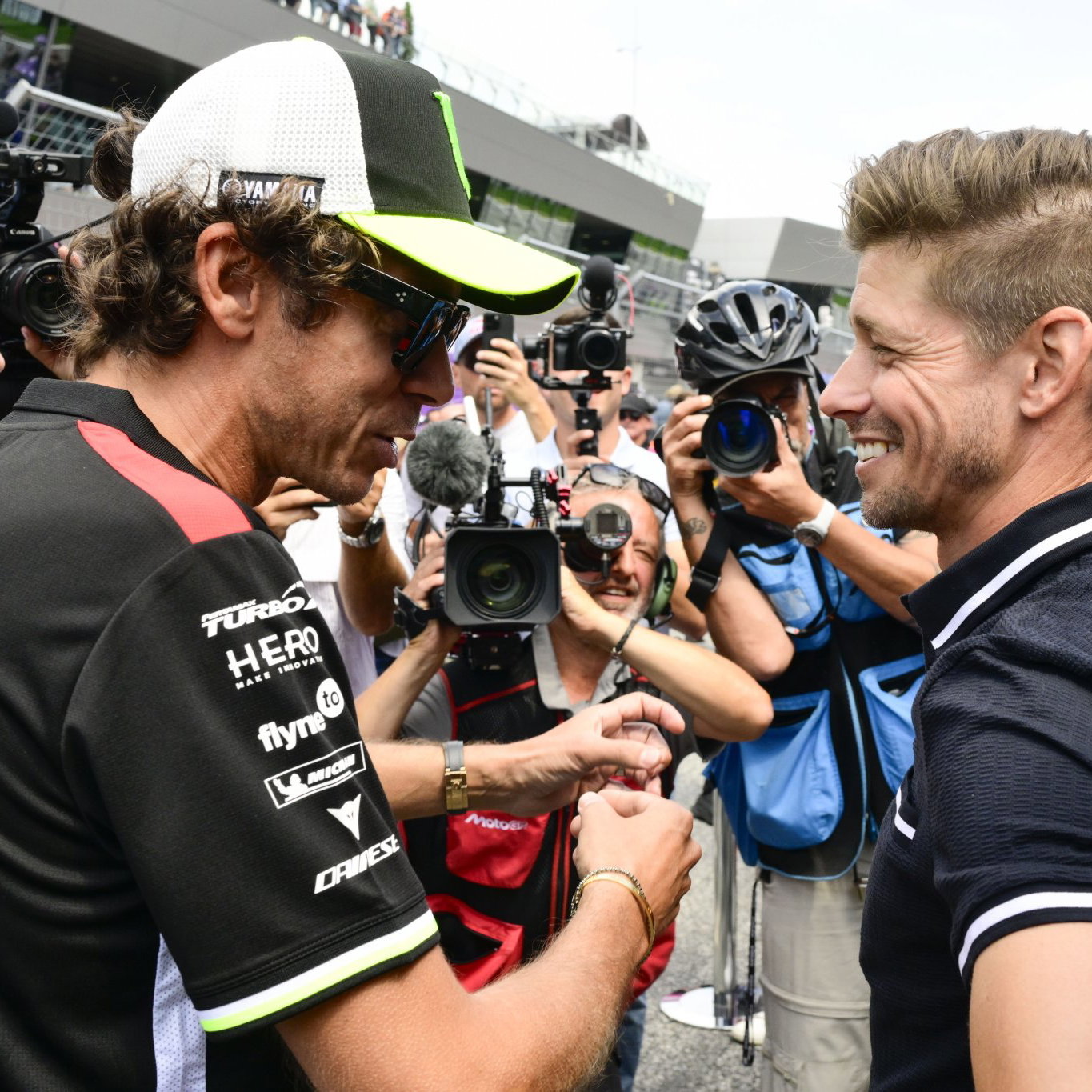 Valentino Rossi, Casey Stoner. 