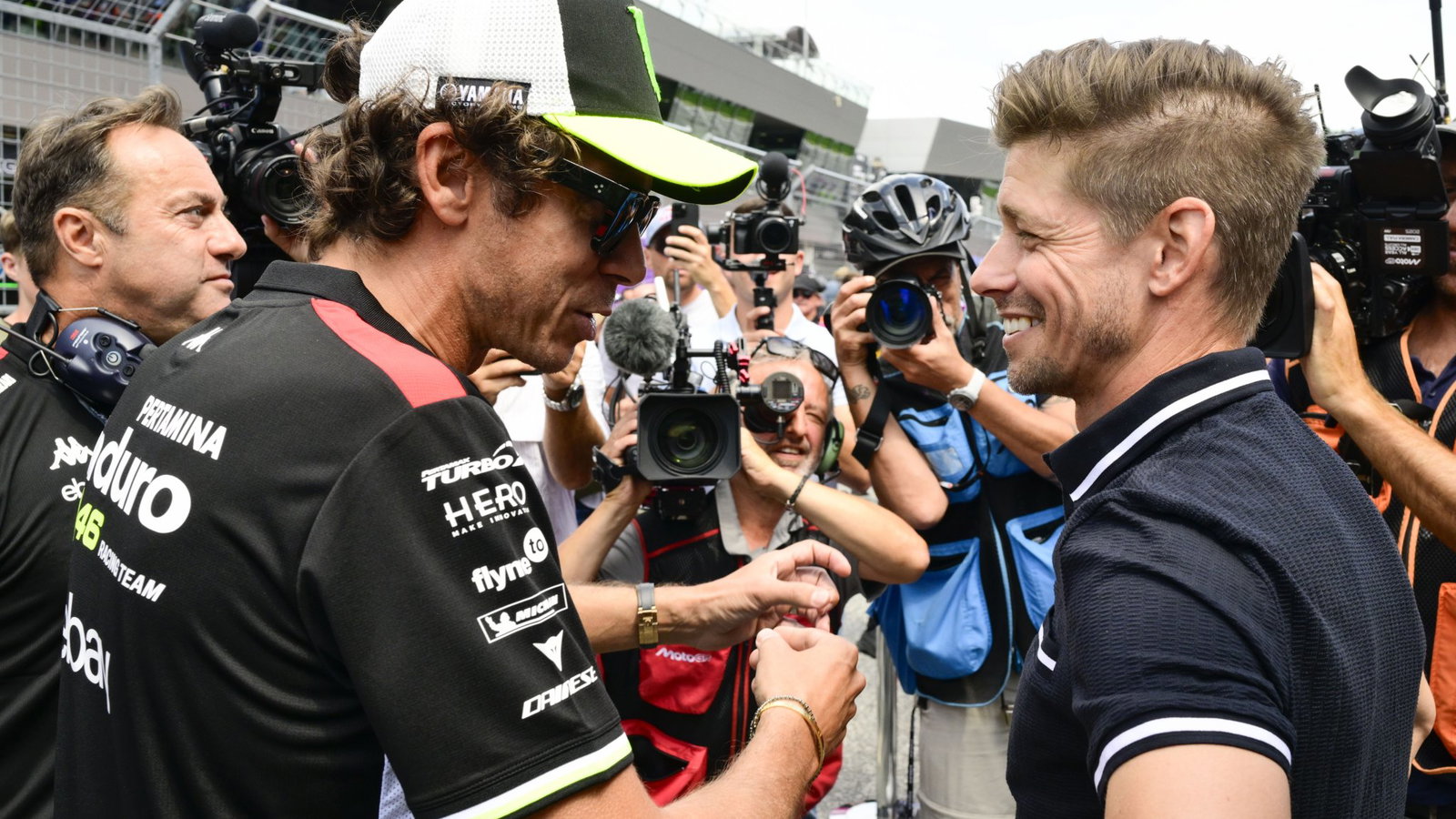 Valentino Rossi, Casey Stoner. 
