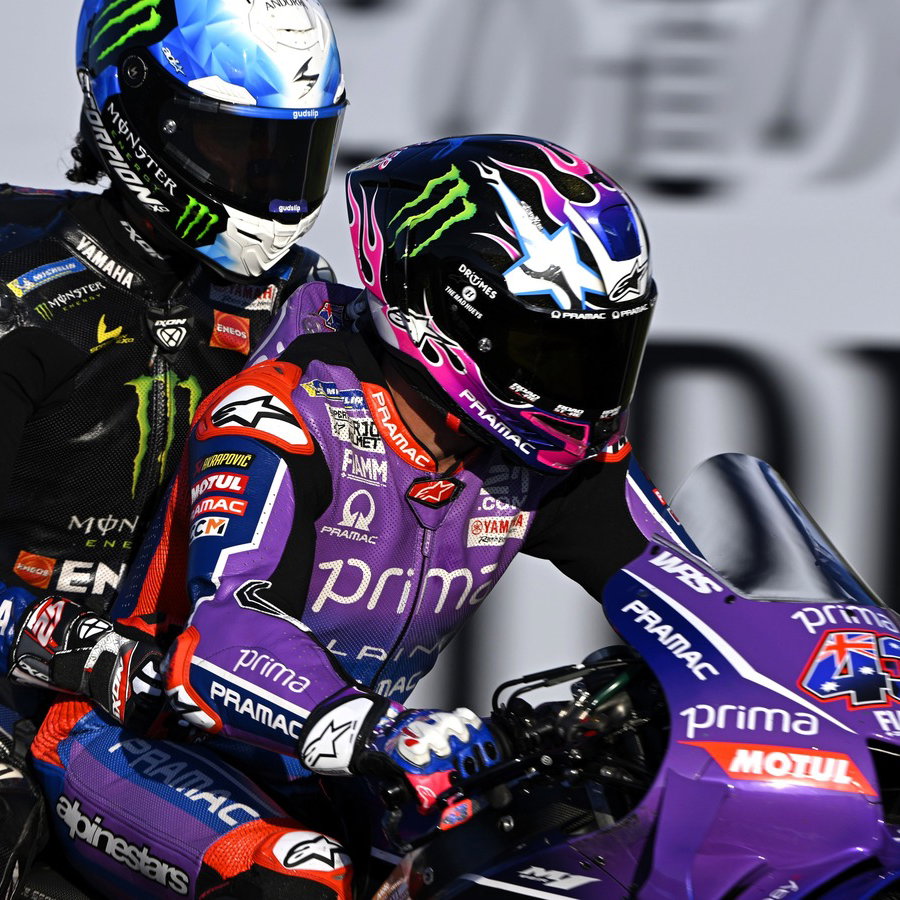 Jack Miller gives Alex Rins a ride back to the pits at Motegi, 2026 Japanese MotoGP.
