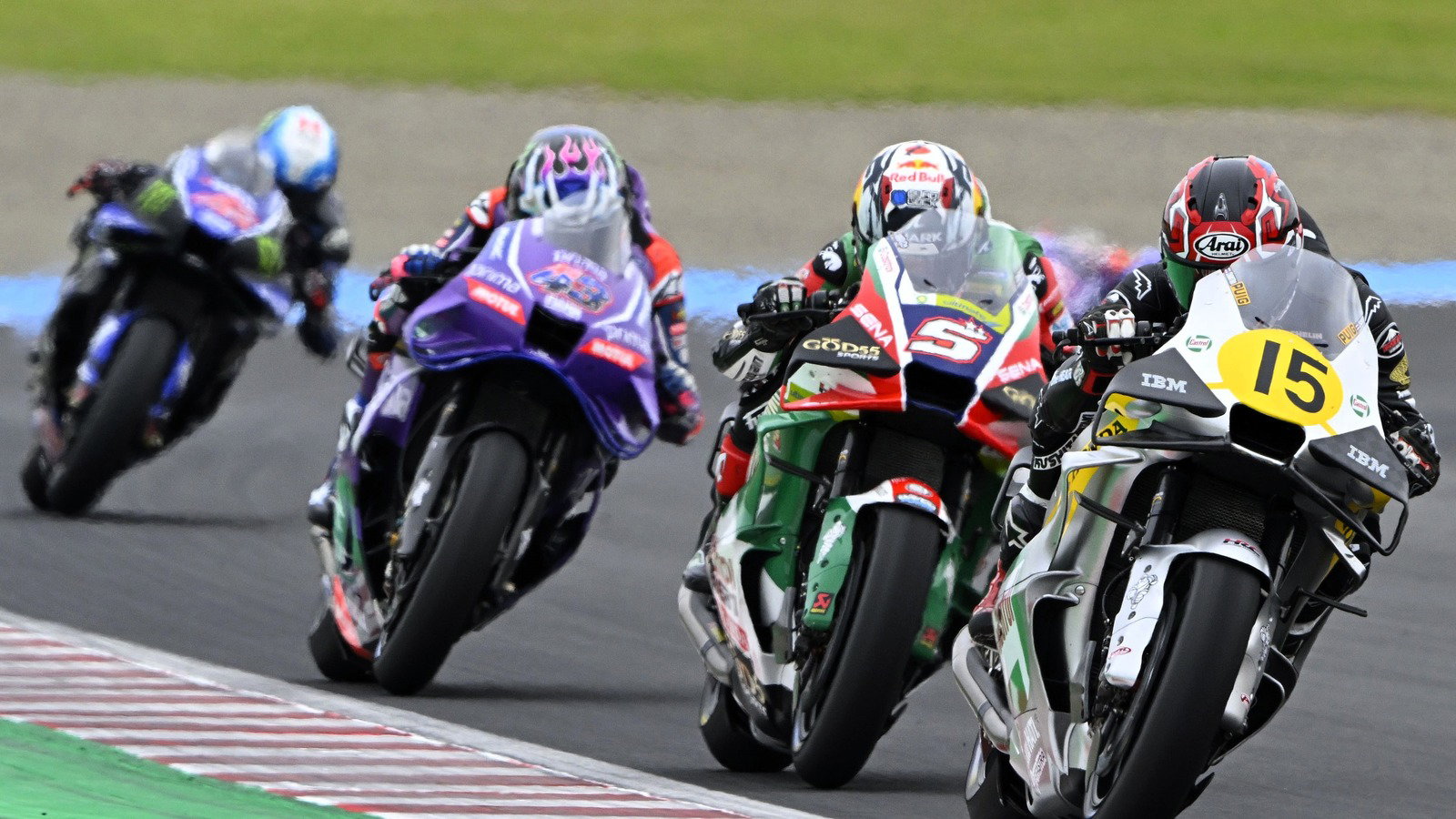 Jack Miller behind the Hondas of Somkiat Chantra and Johann Zarco, 2026 Japanese MotoGP.