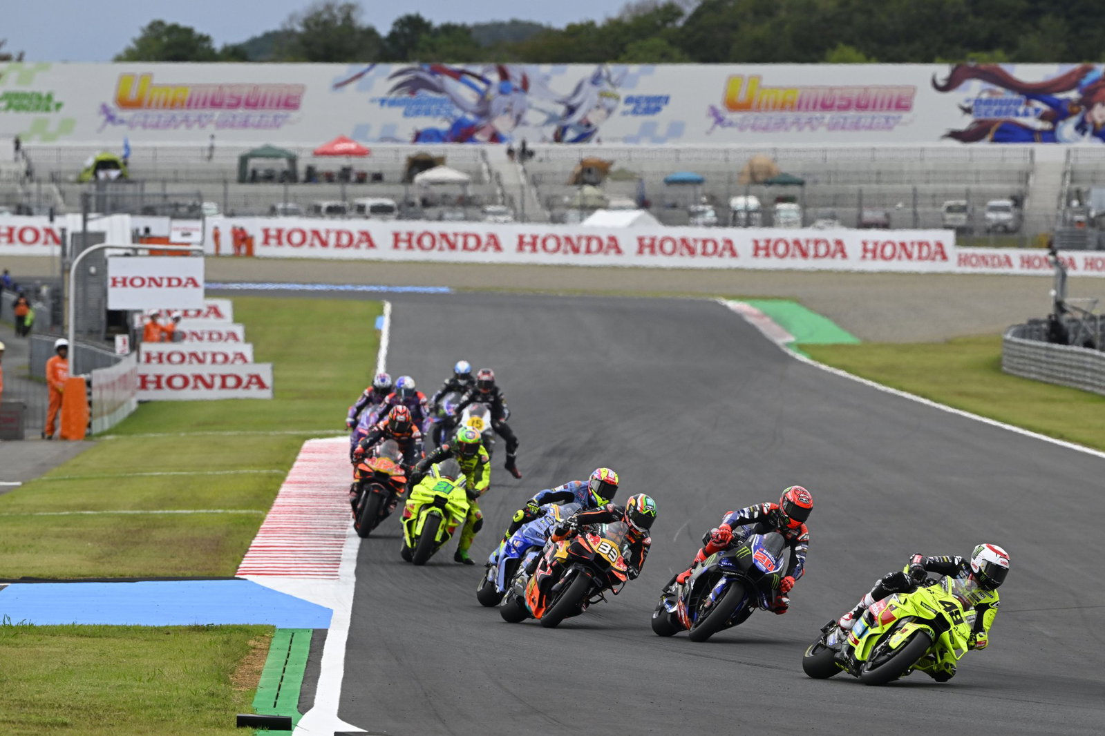 Fabio Di Giannantonio leads Fabio Quartararo & others at 2026 MotoGP Japanese Grand Prix. Credit: Gold and Goose.