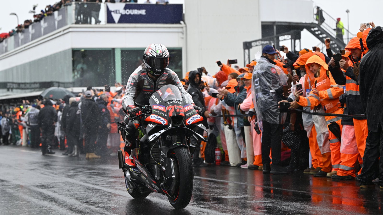Marco Bezzecchi heads out for the parade lap at the cancelled Australian MotoGP.