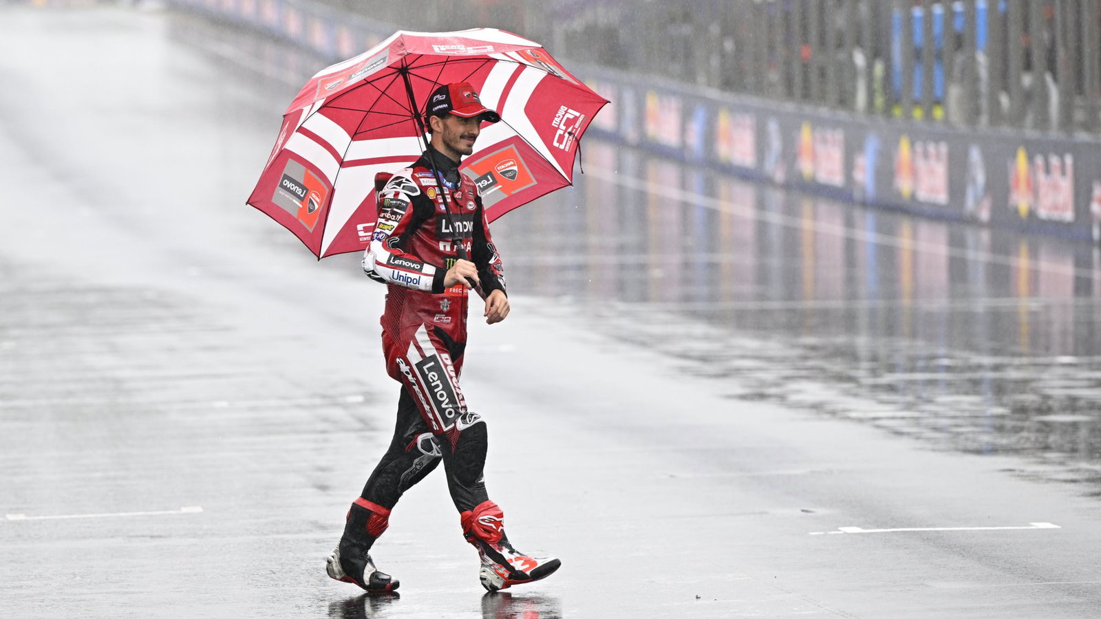 Francesco Bagnaia walks on the Phillip Island grid after the MotoGP race was cancelled.