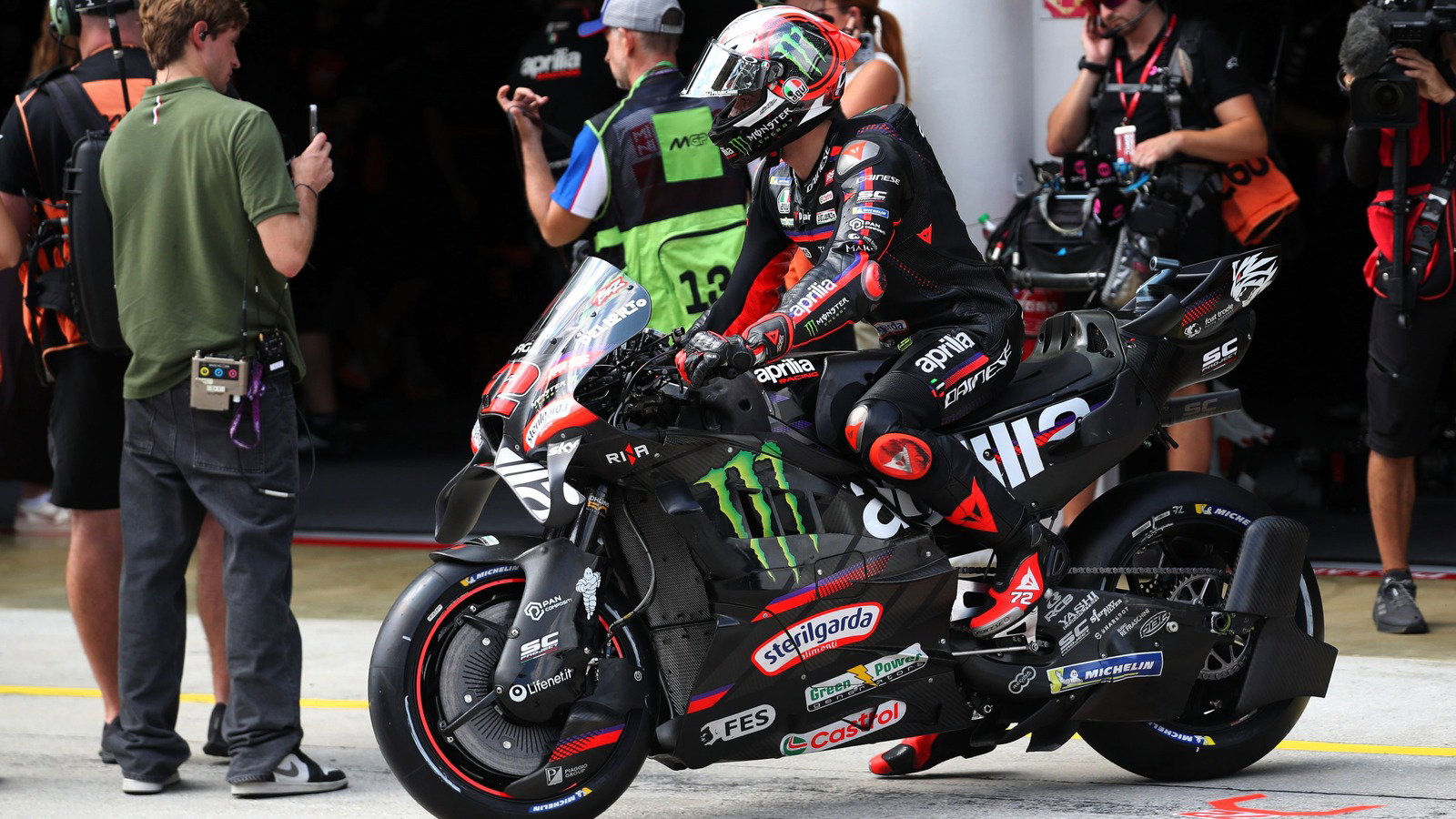 Marco Bezzecchi leaves the pits with new Aprilia aero, Friday, 2026 Malaysian MotoGP. 