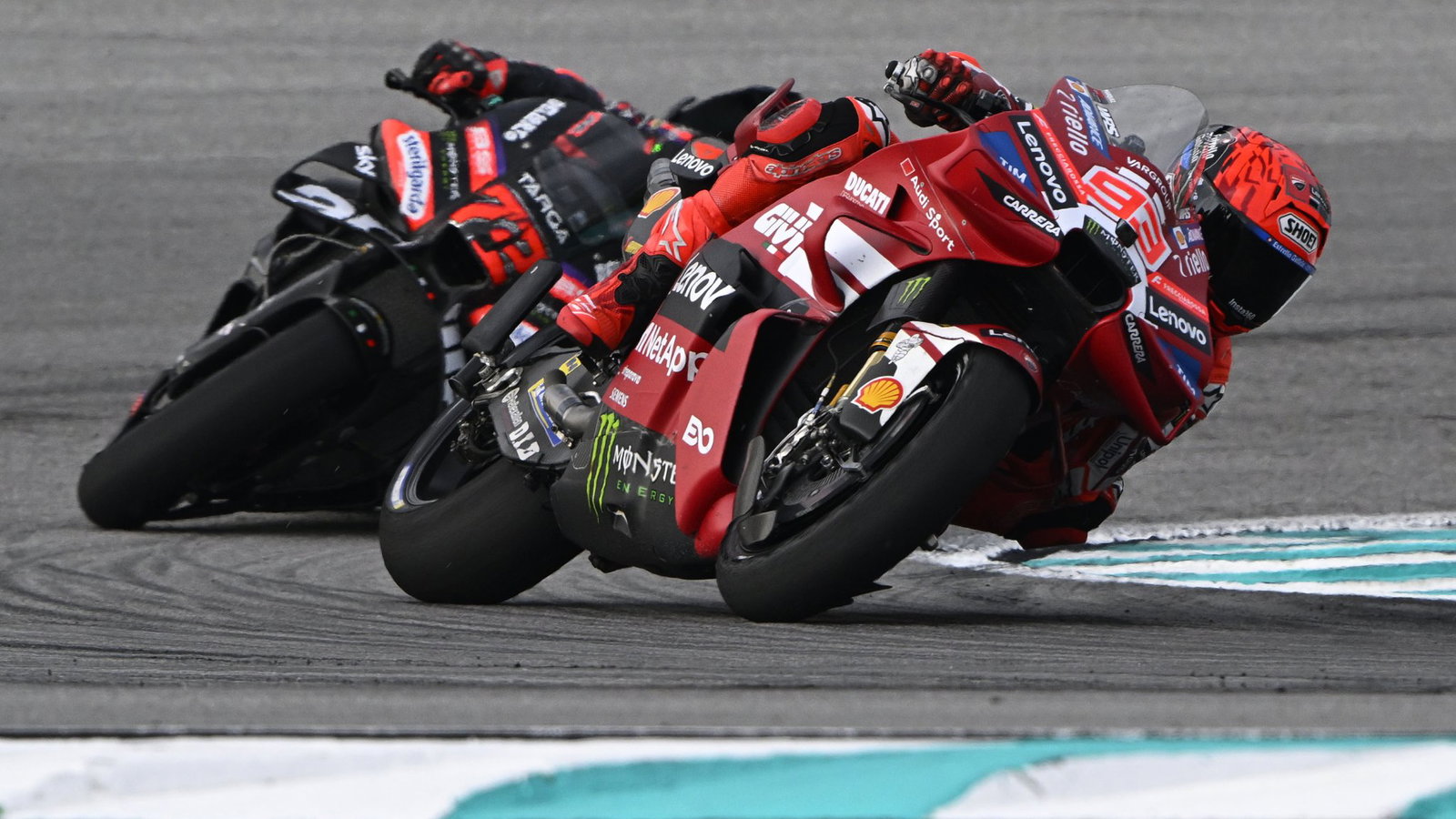 Marc Marquez leads Marco Bezzecchi, 2026 MotoGP Malaysian Grand Prix, Sprint. Credit: Gold and Goose.