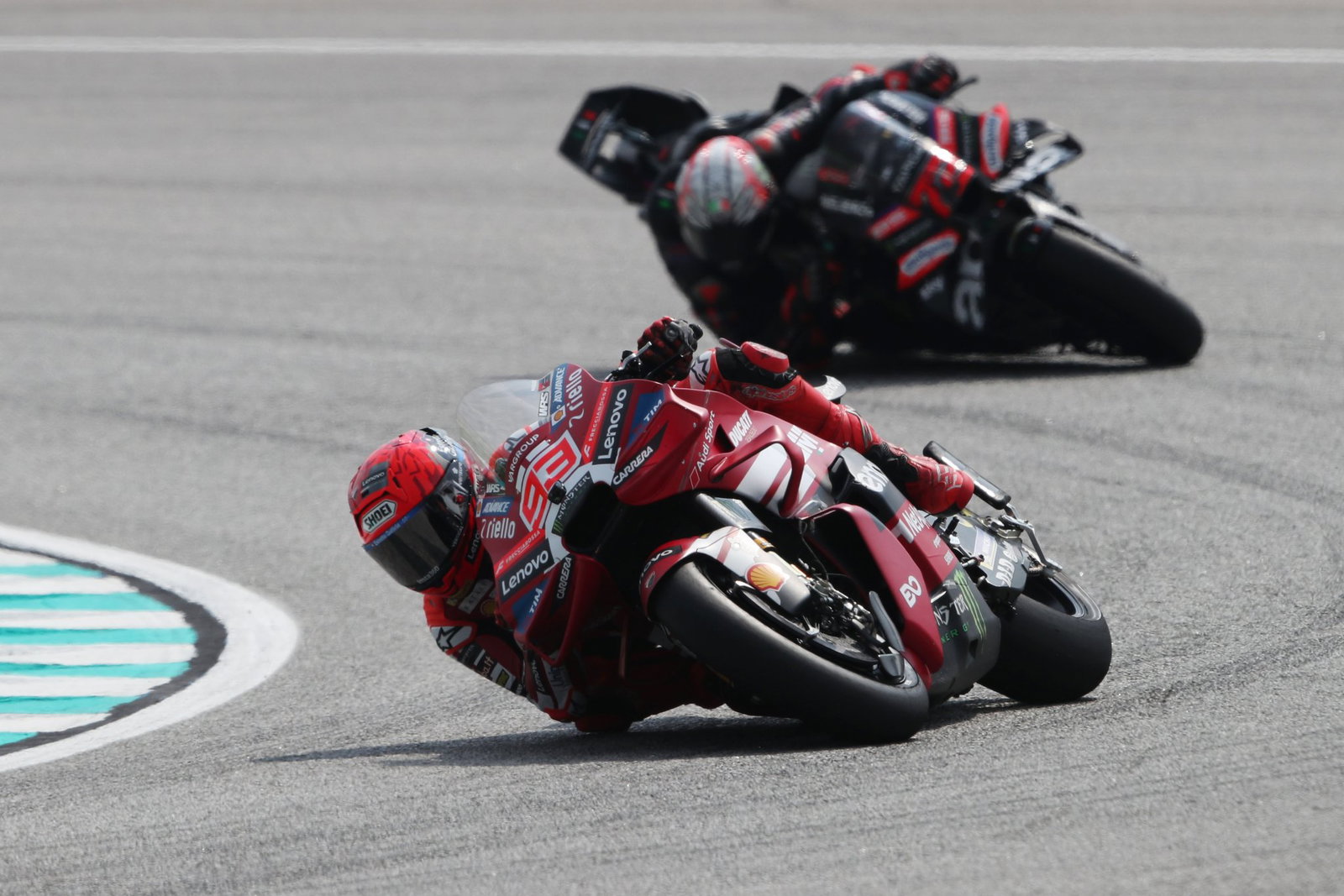 Marc Marquez leads Marco Bezzecchi, 2026 MotoGP Malaysian Grand Prix, Sprint. Credit: Gold and Goose.