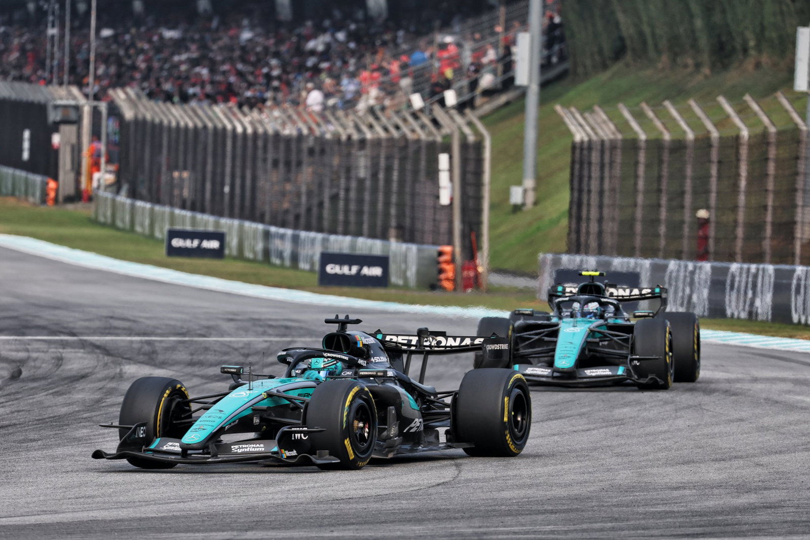 George Russell leading Kimi Antonelli