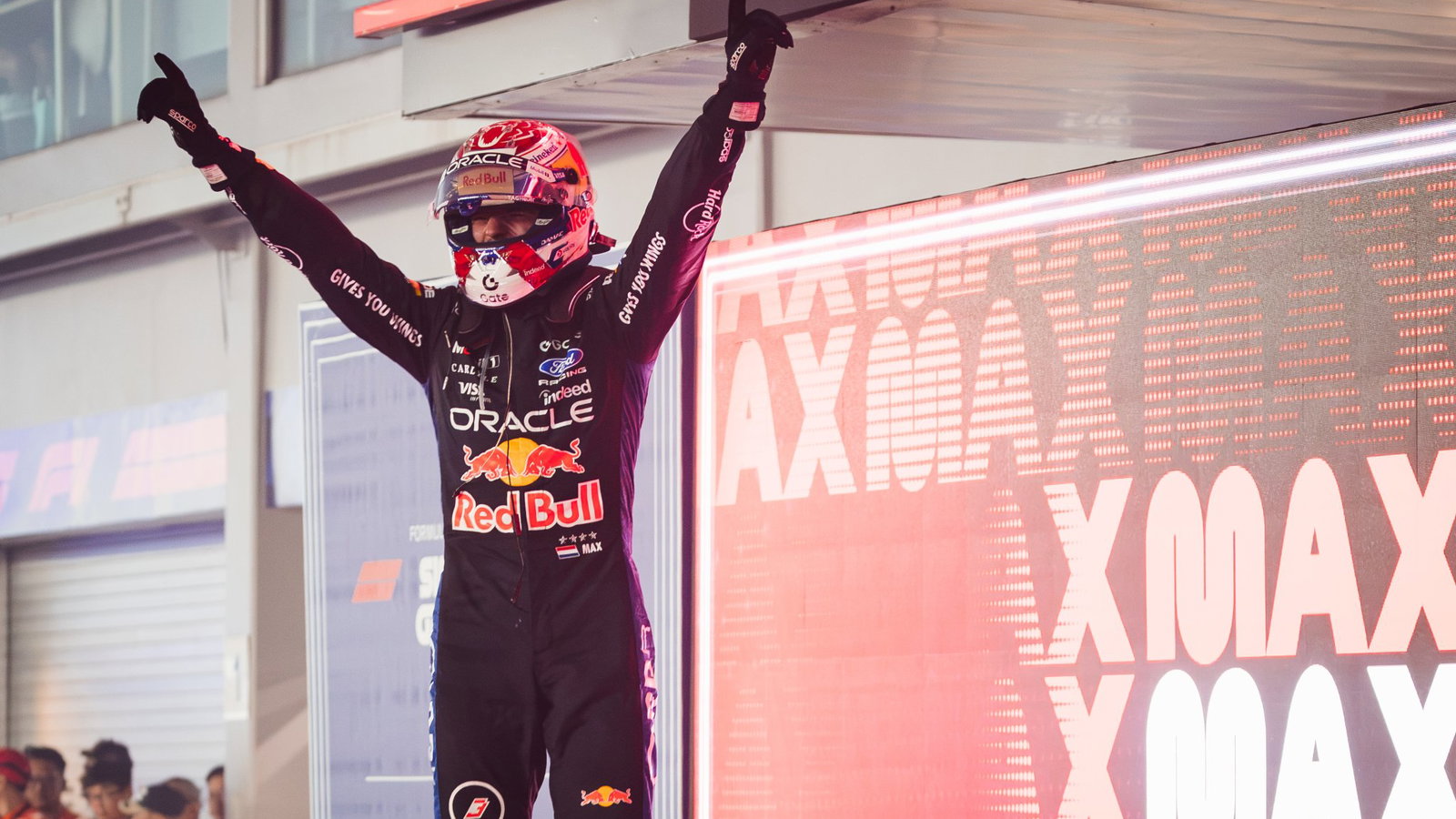 Max Verstappen celebrates his first Singapore Grand Prix victory