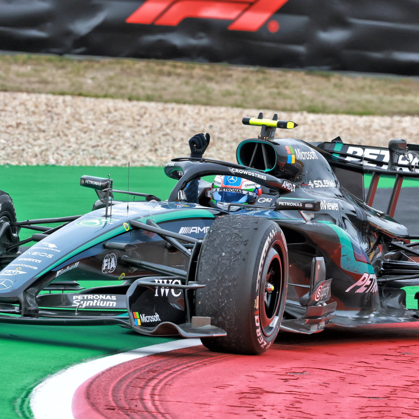 Kimi Antonelli celebrates his win at COTA 