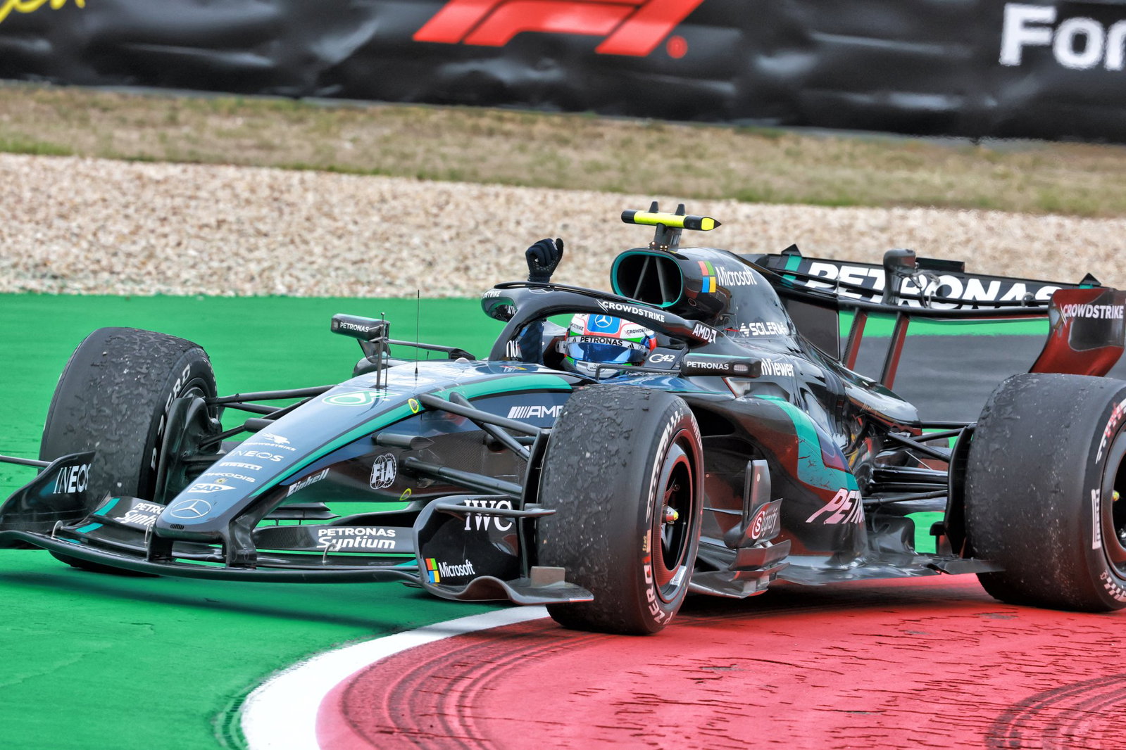 Kimi Antonelli celebrates his win at COTA