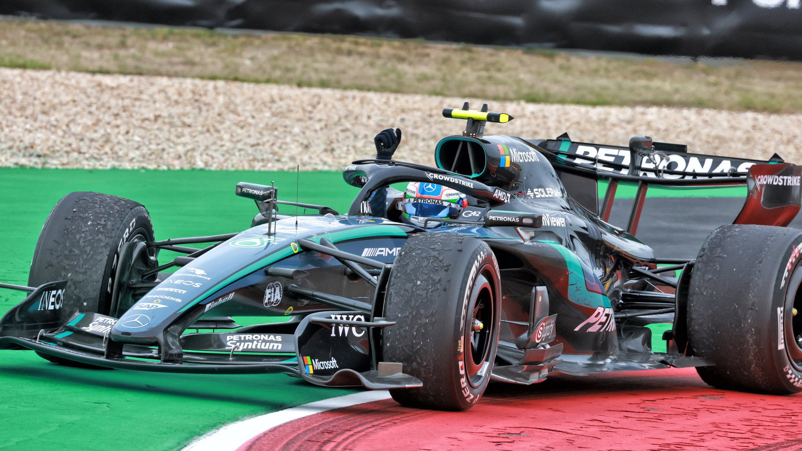 Kimi Antonelli celebrates his win at COTA