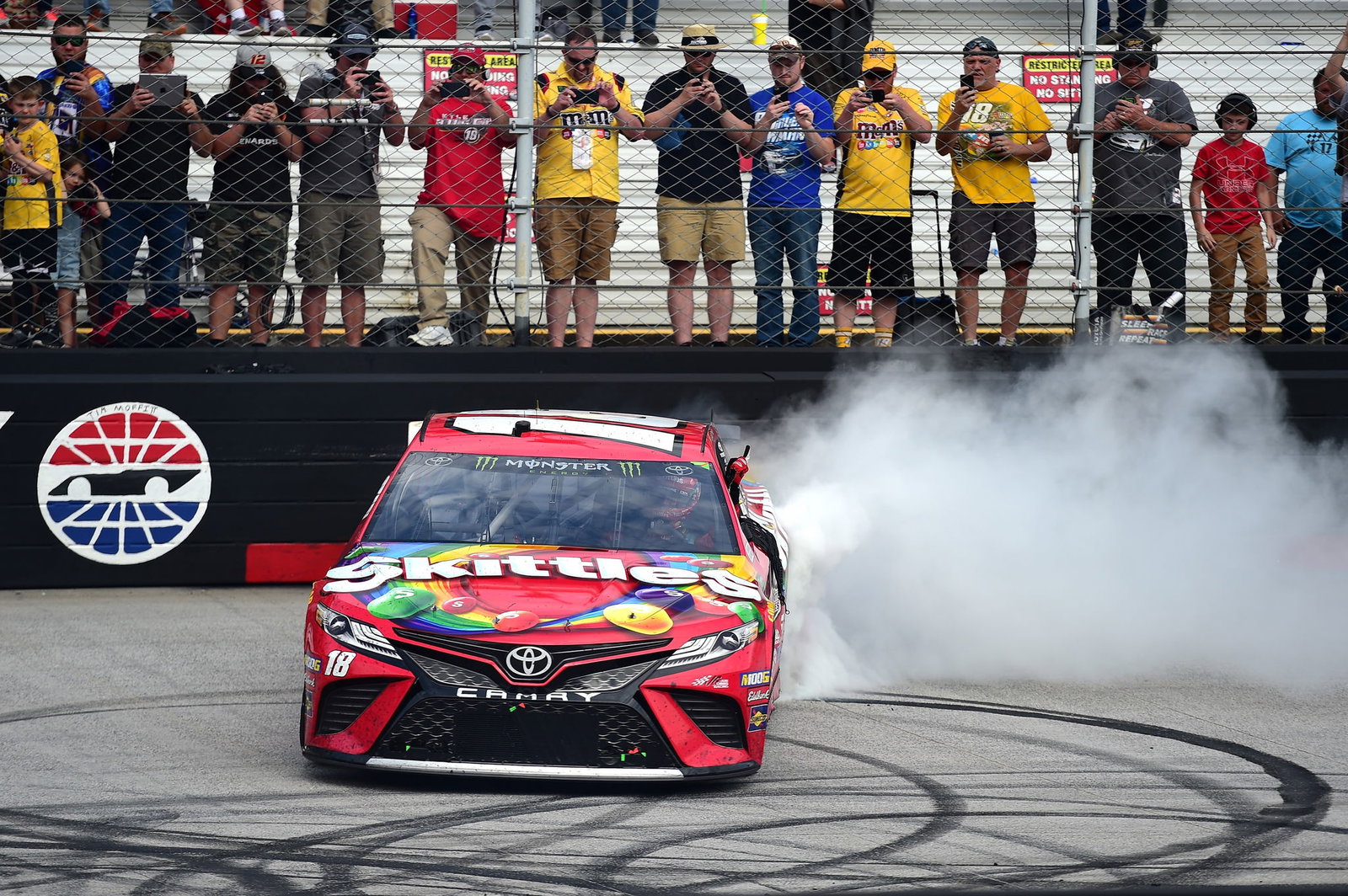 Truex holds off Logano for first short track win