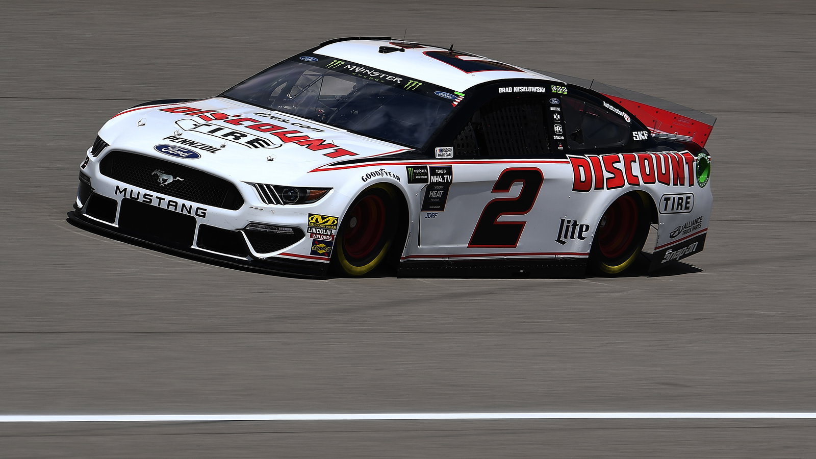 Brad Keselowski bests Kevin Harvick for Michigan pole
