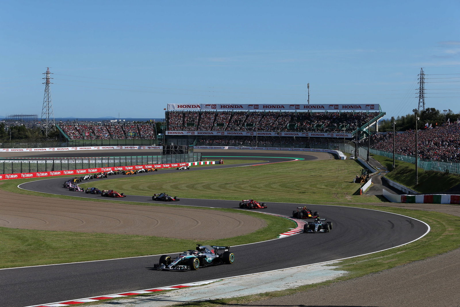 Lewis Hamilton takes dominant Japan win, Vettel sixth after collision