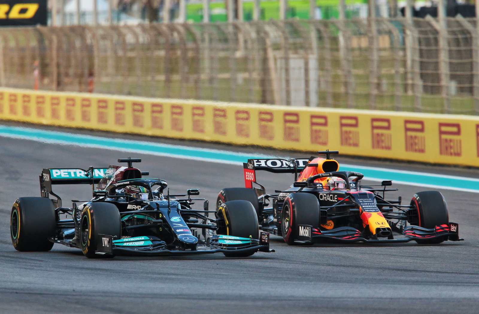 Verstappen wins F1 title after last-lap pass on Hamilton in dramatic finale