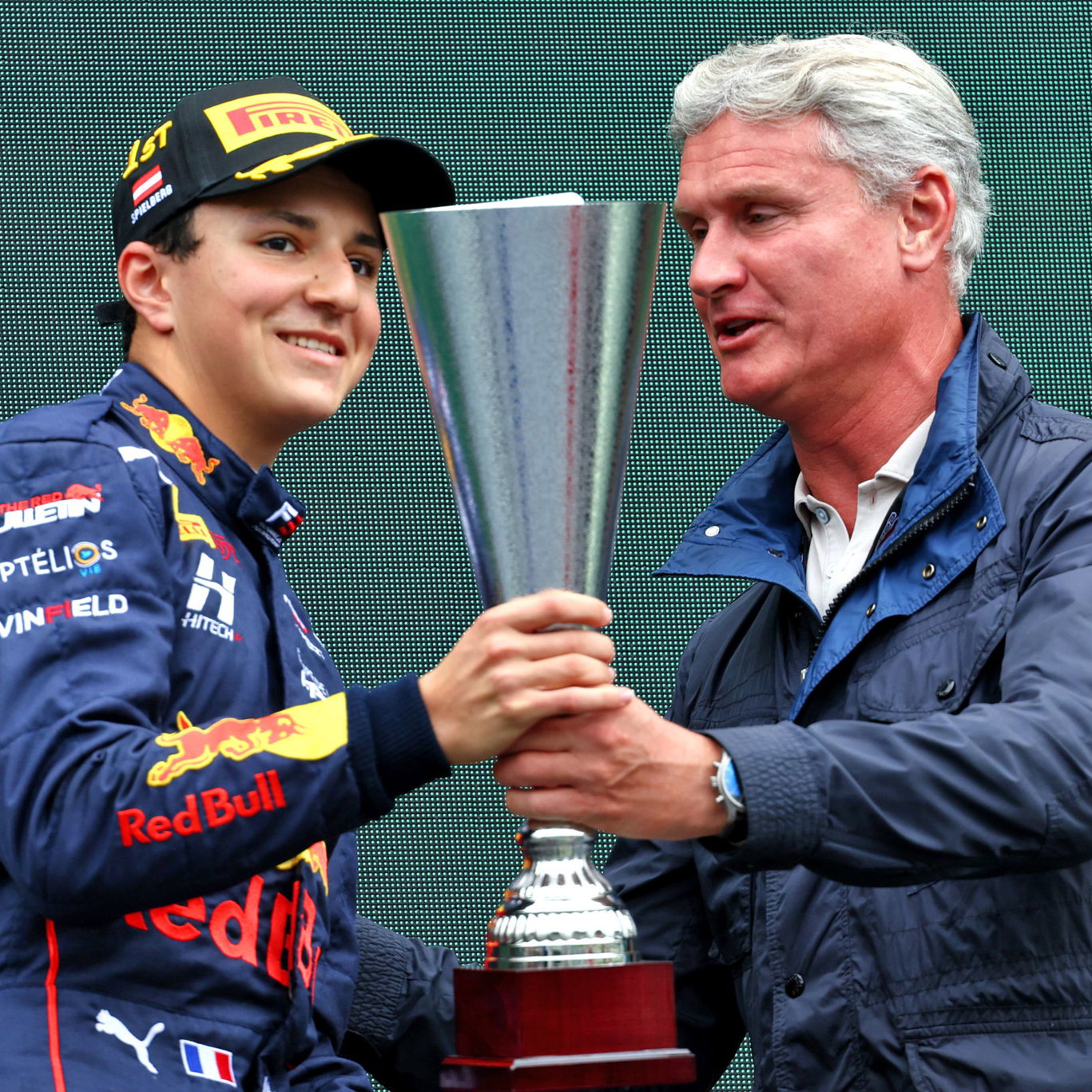 Mikola takes pole for Asian opener.