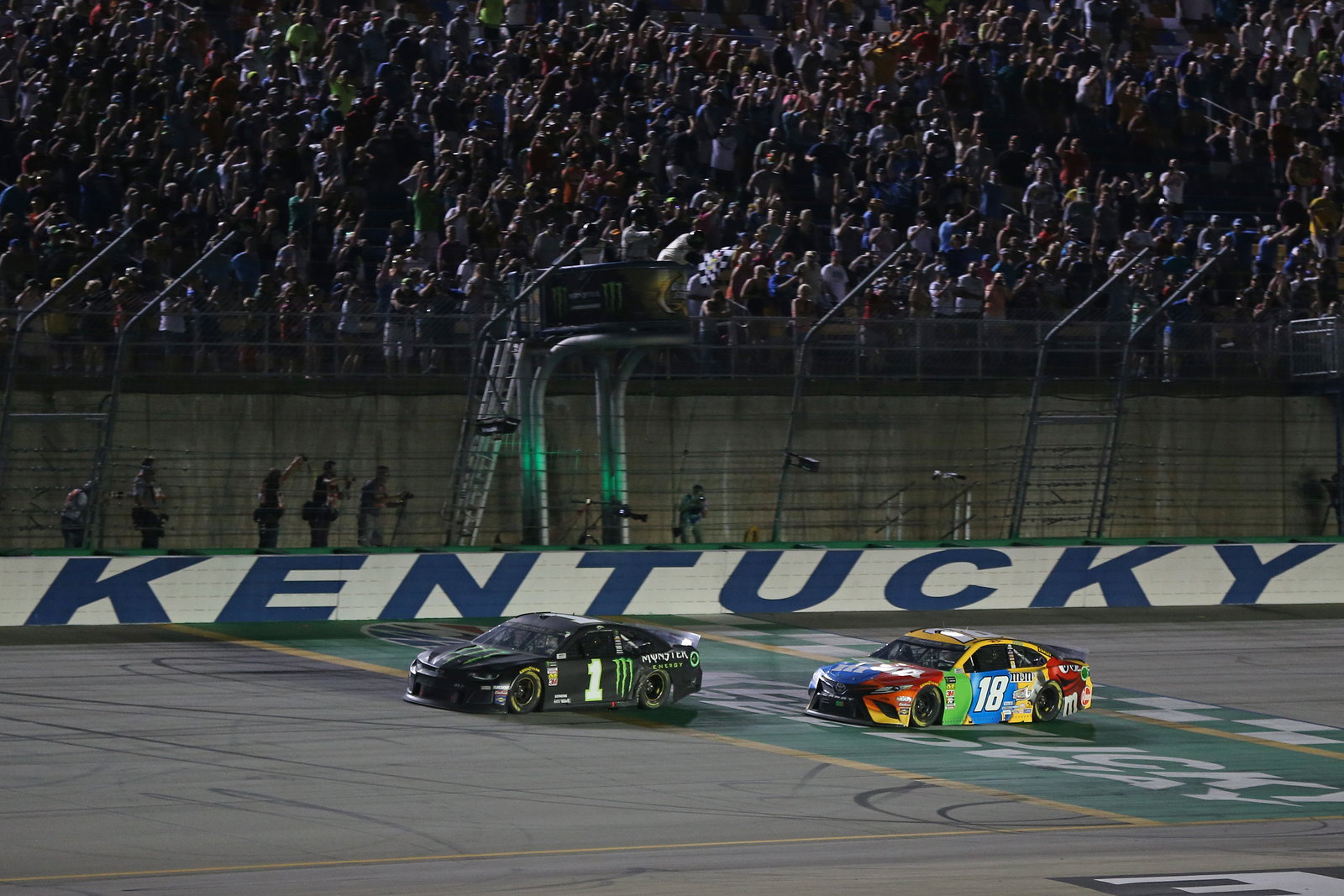 Kurt Busch victorious over brother Kyle in overtime finish at Kentucky