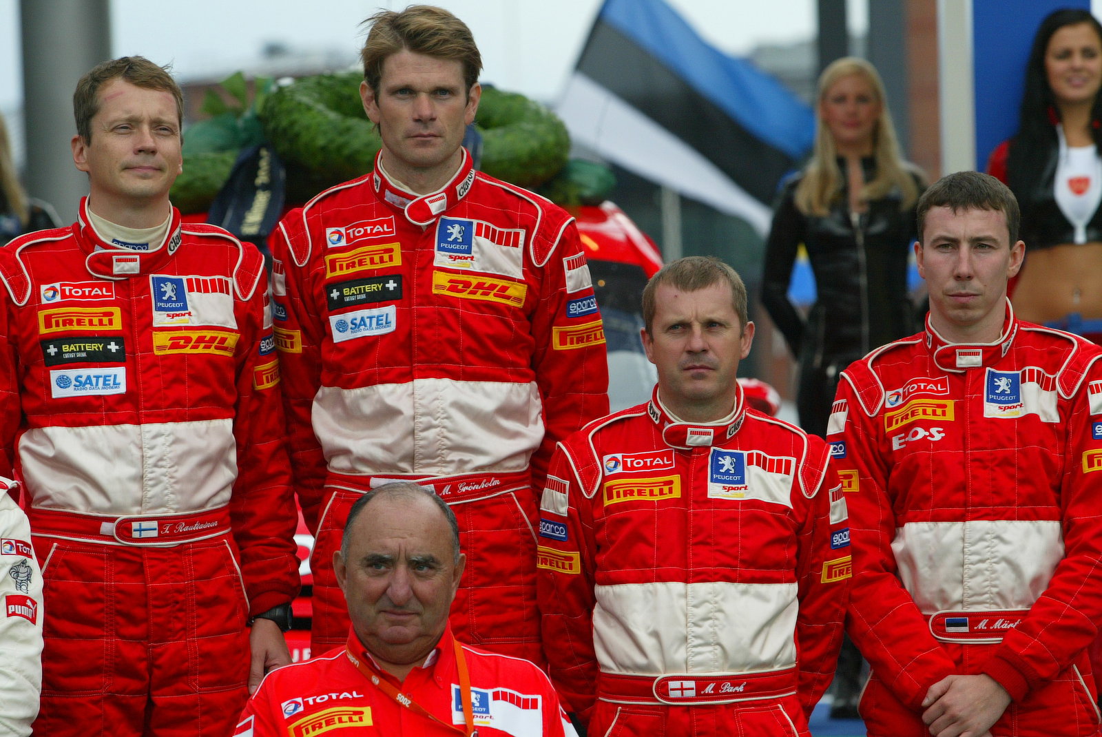 Rally Finland winners, Marcus Gronholm and Timo Rautiainen on the podium at the finish, with team bo