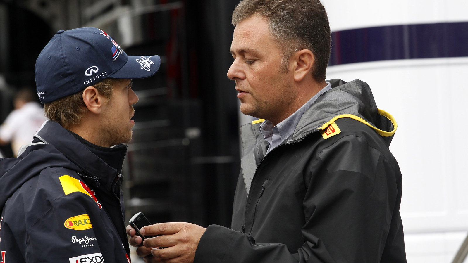 28.08.2011- Sebastian Vettel (GER), Red Bull Racing, RB7 and Mario Isola (ITA), Sporting Director Pi