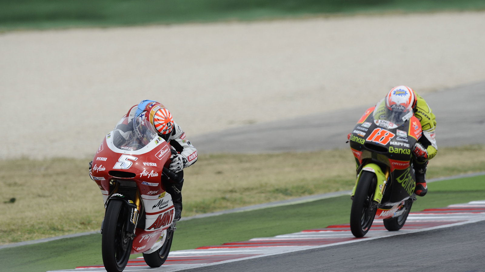 Zarco looks back coming out of the last corner on the last lap, San Marino 125GP Race 2011