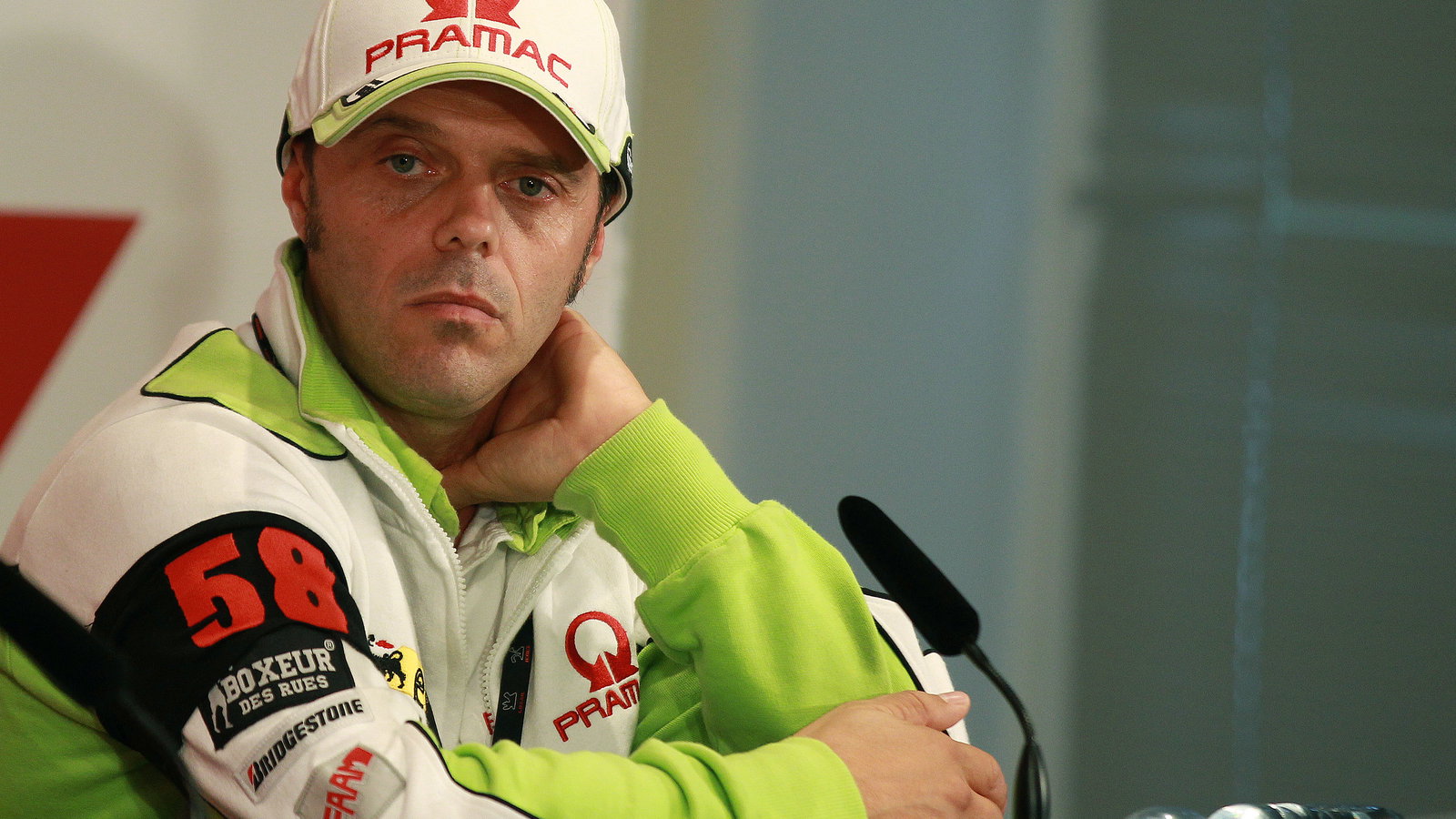 Capirossi with black Simoncelli armband, Valencia MotoGP 2011