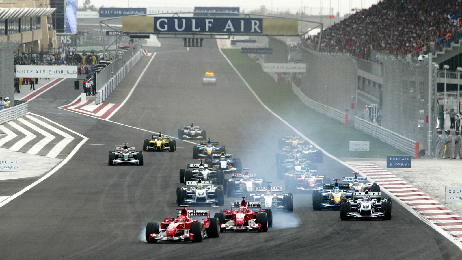 There was plenty of tyre smoke as the two Ferraris came close to touching at the start of the first