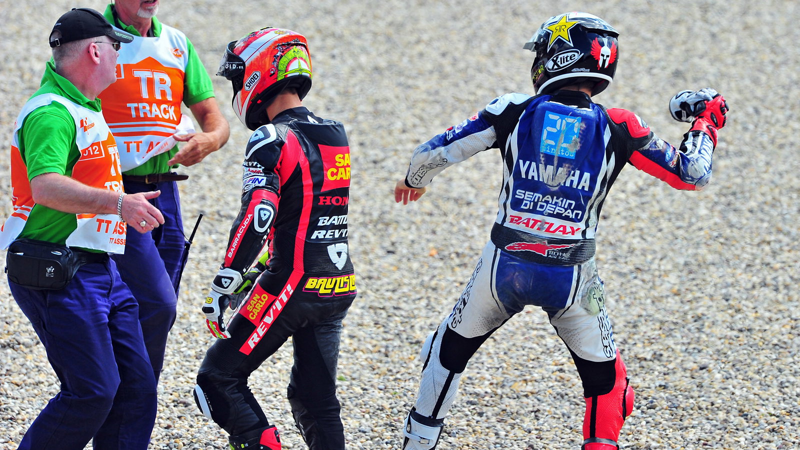 Barbera and Lorenzo after crash, Dutch MotoGP 2012