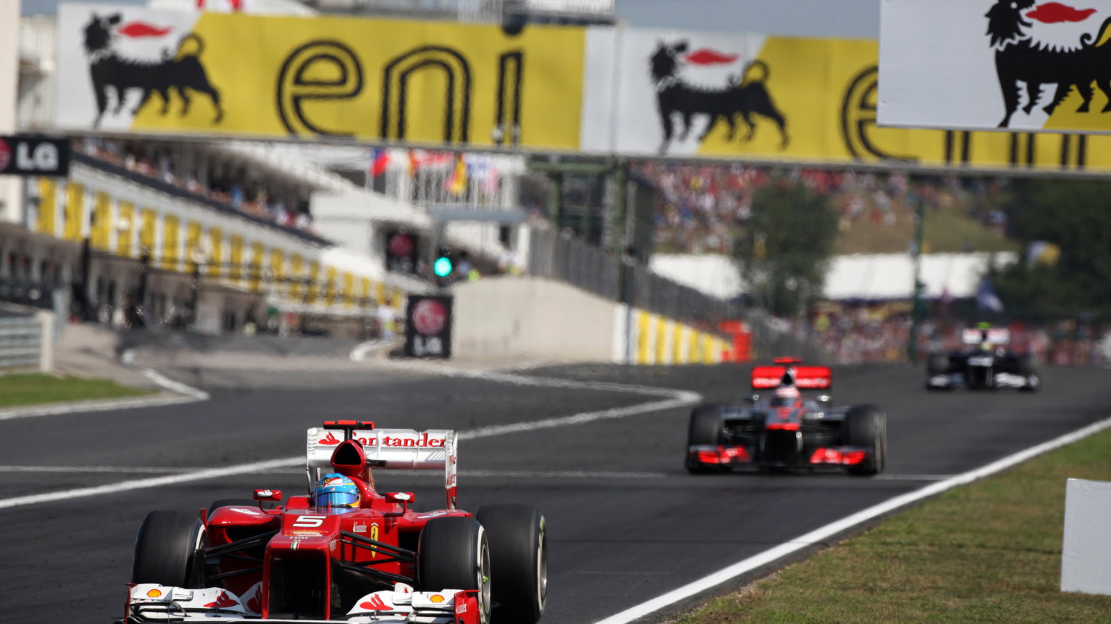 29.07.2012- Race, Fernando Alonso (ESP) Scuderia Ferrari F2012 leads Jenson Button (GBR) McLaren Mer