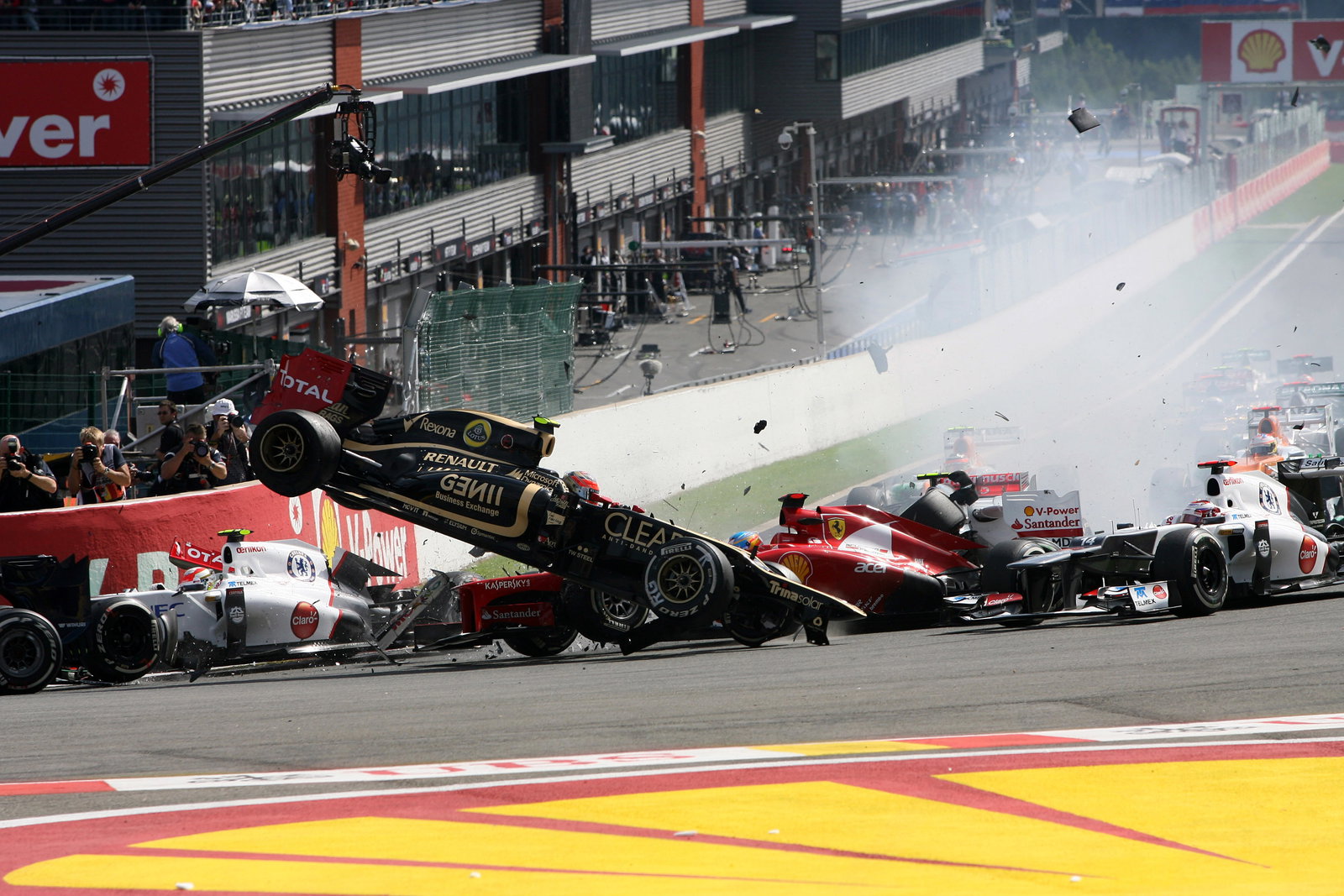 02.09.2012- Race, Start of the race, Crash, Romain Grosjean (FRA) Lotus F1 Team E20