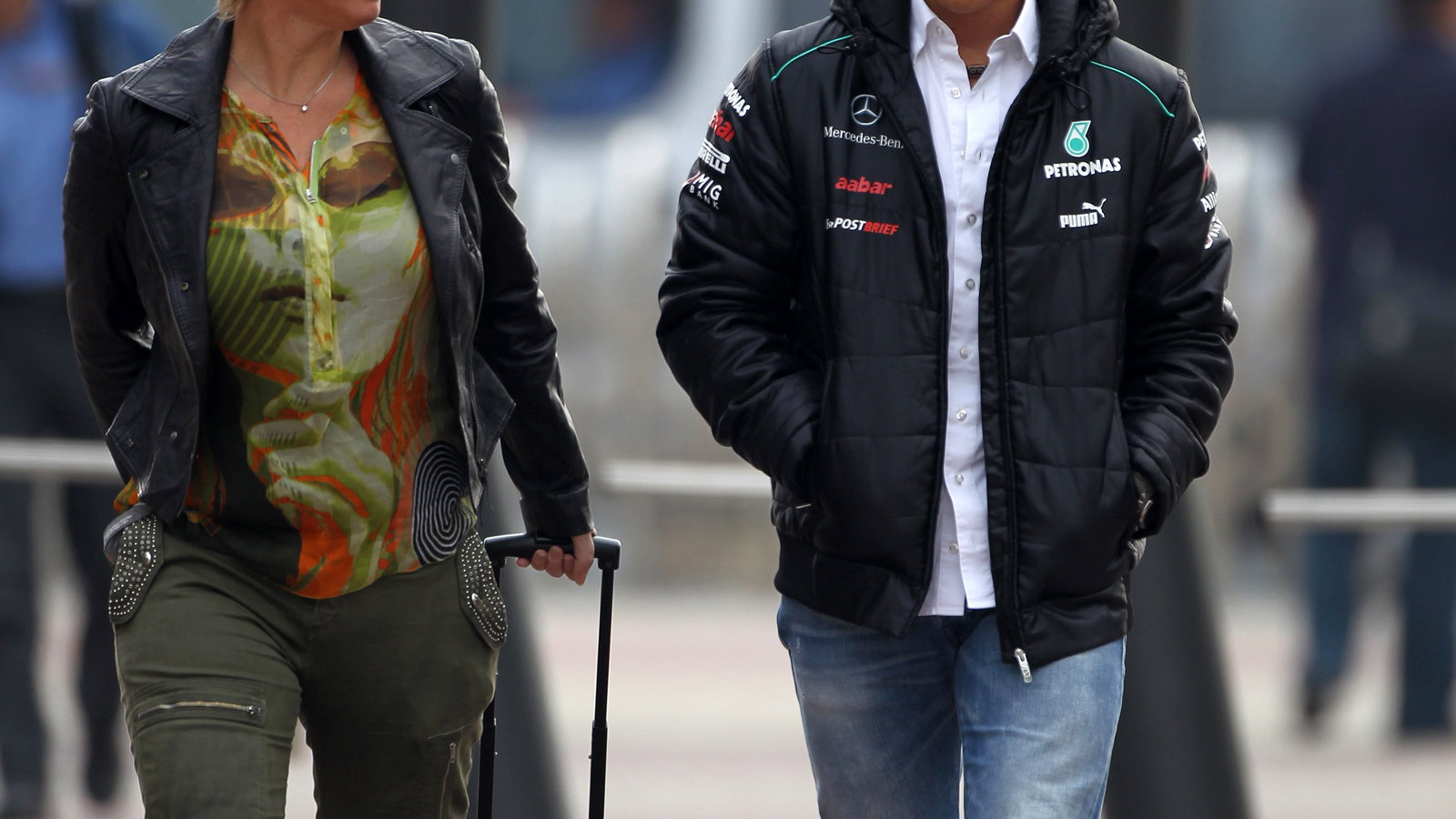 13.10.2012- Sabine Kehm (GER), Michael Schumacher's press officer and Michael Schumacher (GER) Merc