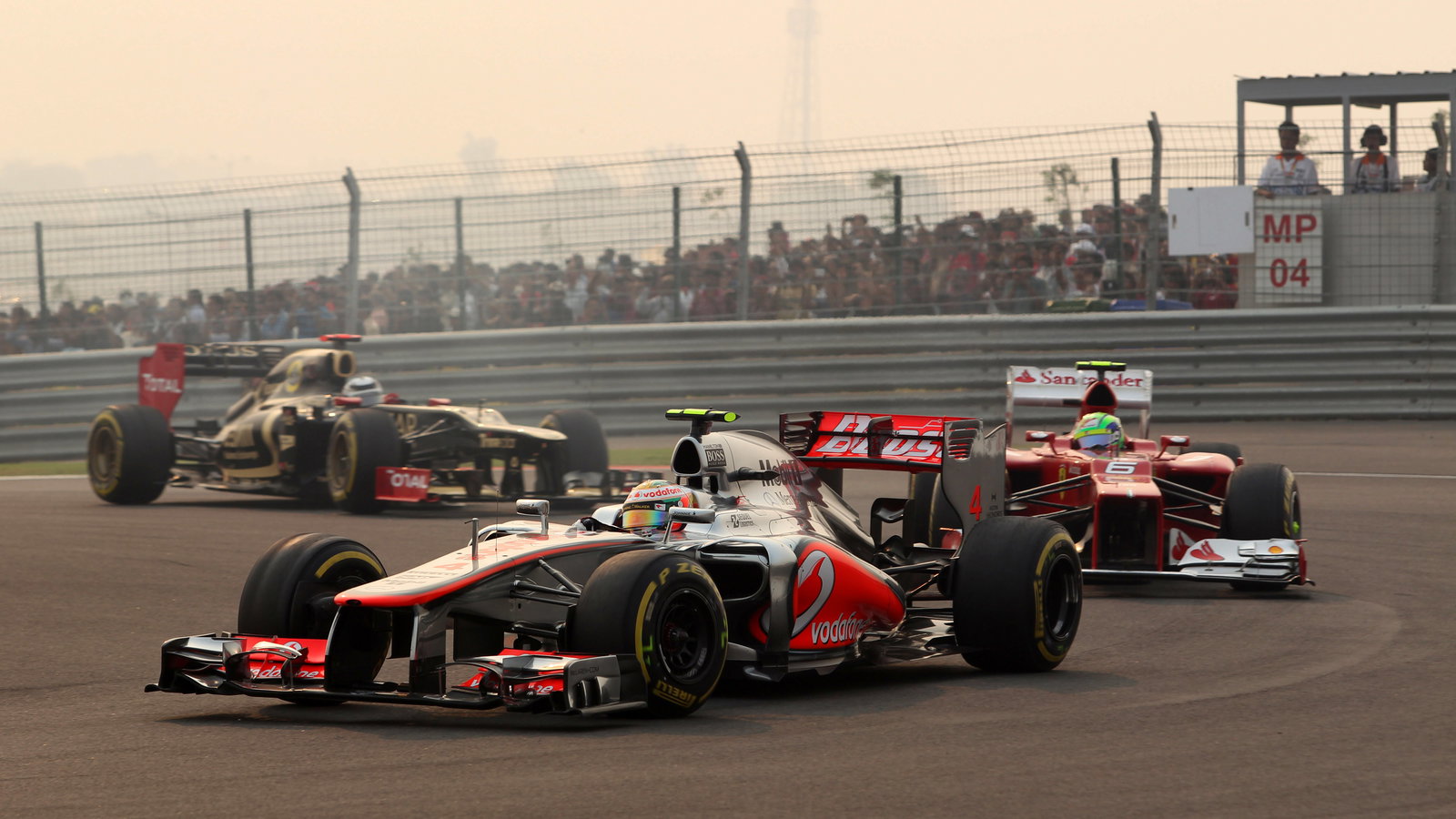 28.10.2012- Race, Lewis Hamilton (GBR) McLaren Mercedes MP4-27 leads Felipe Massa (BRA) Scuderia Fer