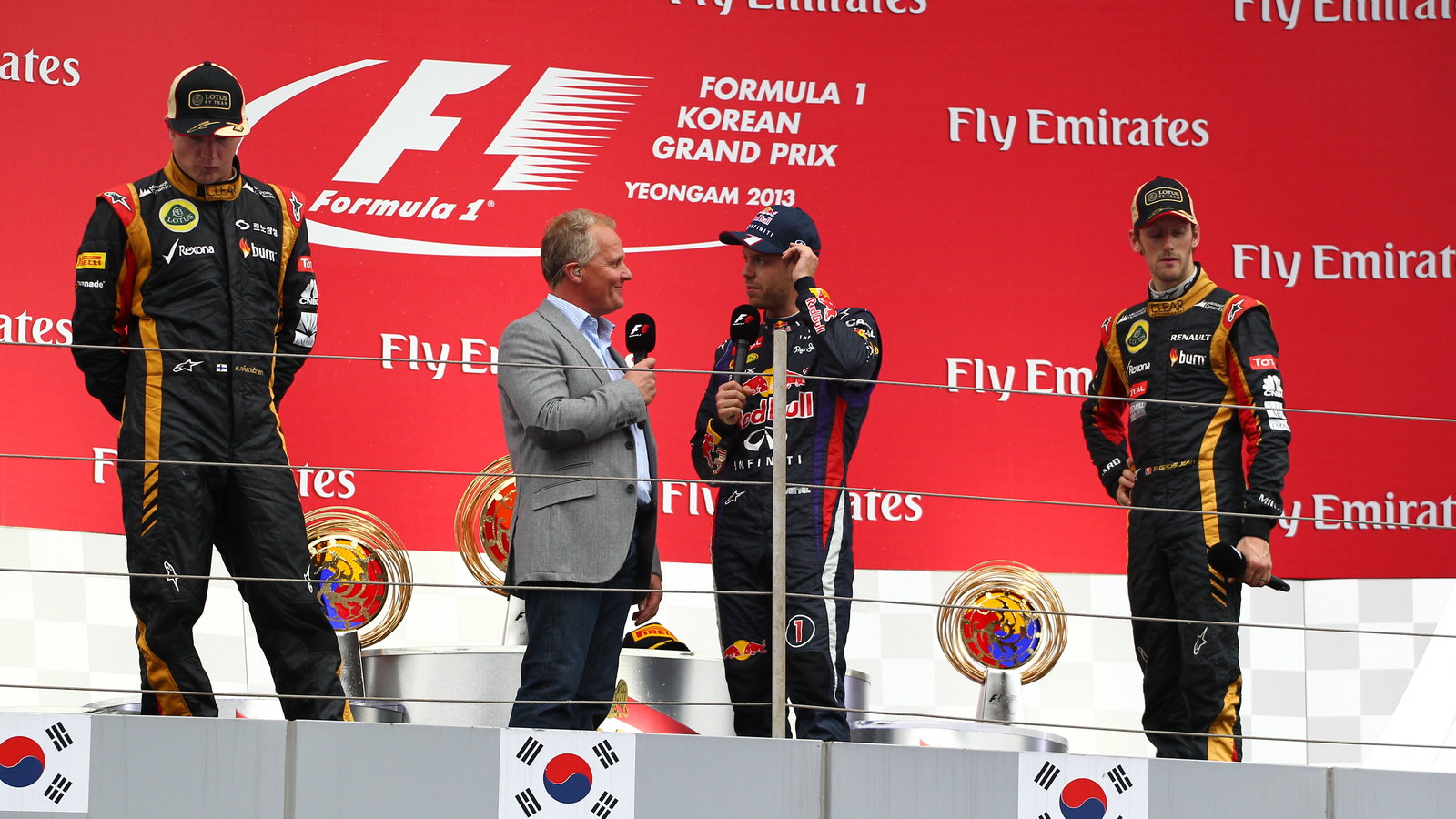 06.10.2013- The Podium, winner Sebastian Vettel (GER) Red Bull Racing RB9, 2nd Kimi Raikkonen (FIN)