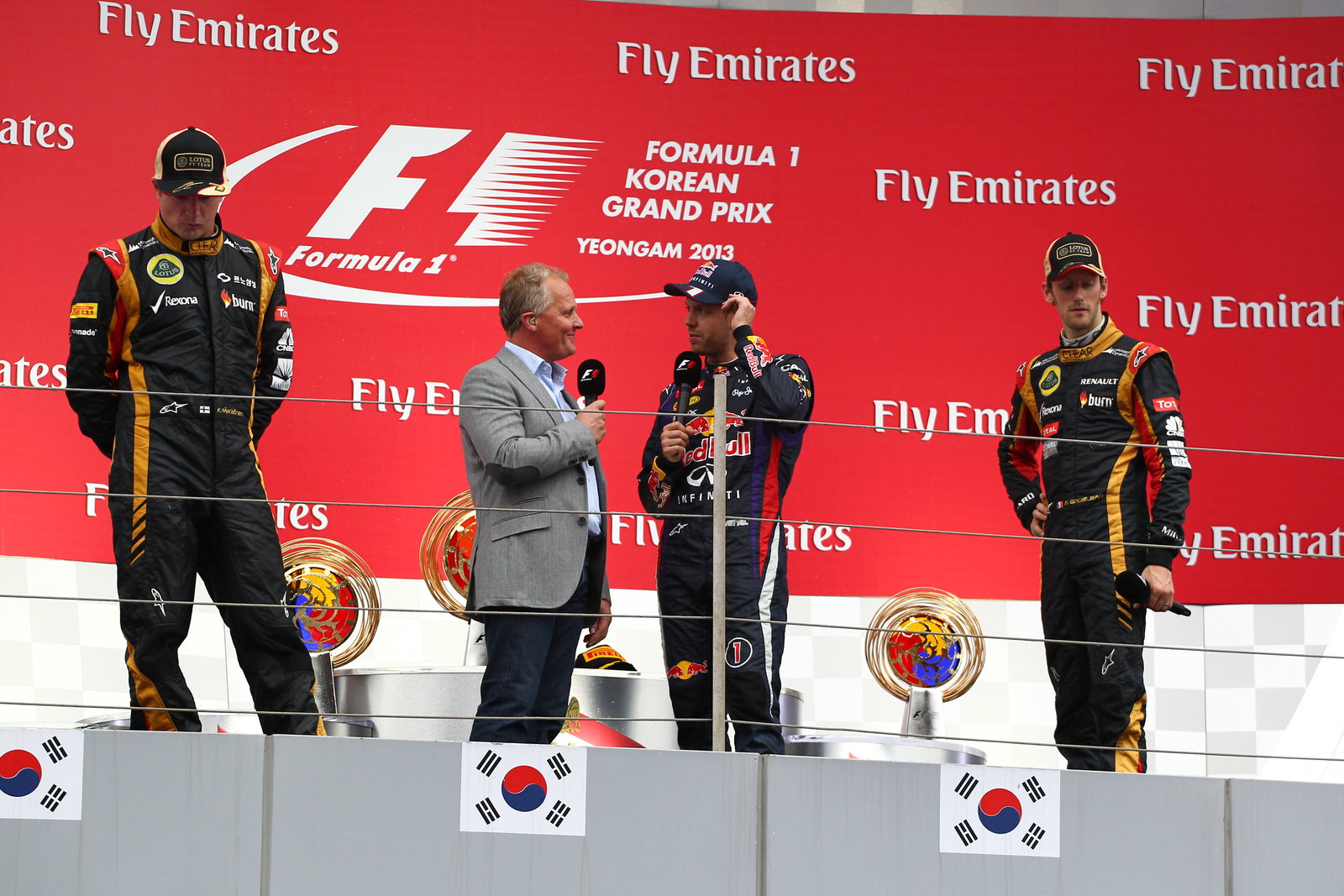 06.10.2013- The Podium, winner Sebastian Vettel (GER) Red Bull Racing RB9, 2nd Kimi Raikkonen (FIN)