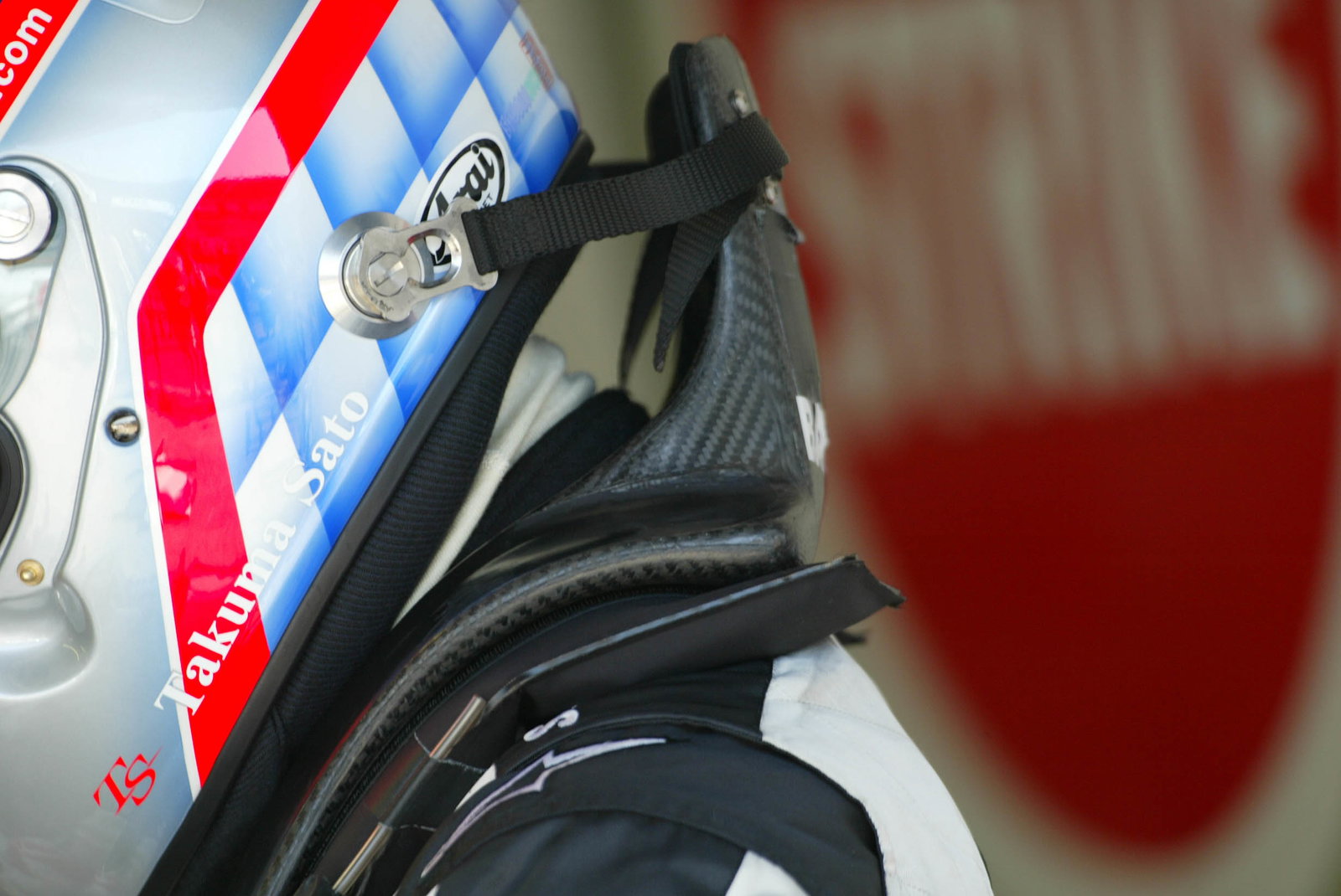 HANS device as worn by BAR`s Takuma Sato