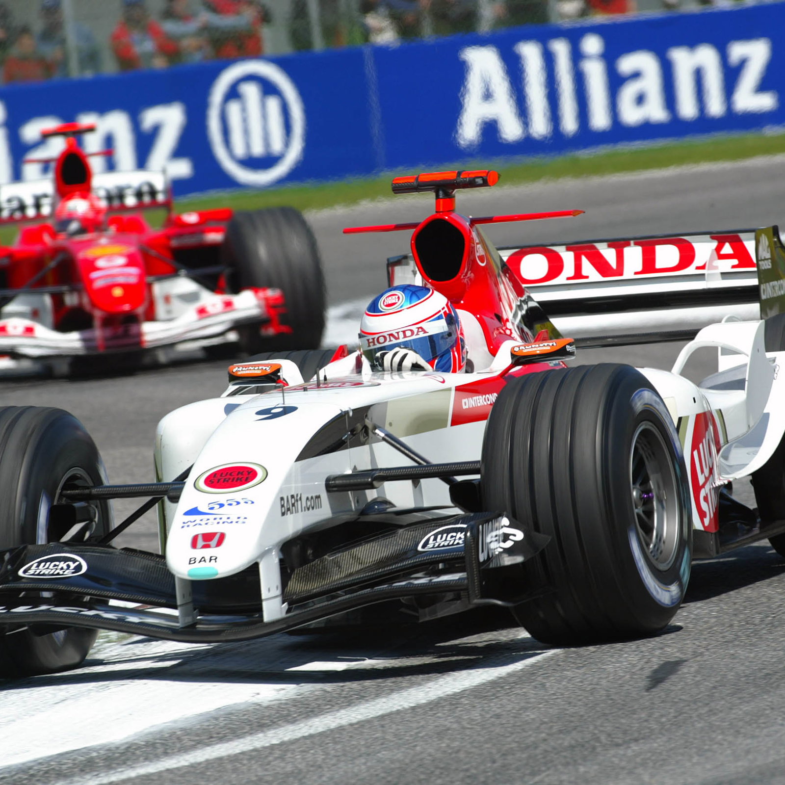 Jenson Button (BAR-Honda) leads Michael Schumacher (Ferrari) during the San Marino GP