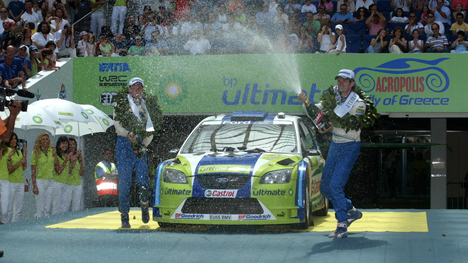 BP Ford`s Marcus Gronholm and co-driver, Timo Rautiainen celebrate their Acropolis Rally win