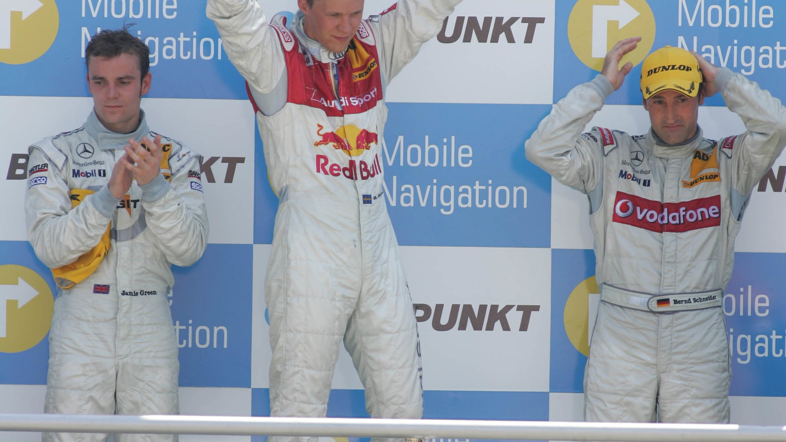 Podium L-R: Jamie Green (2nd), Mathias Ekstrom (winner), Bernd Schneider (3rd).DTM, Round 4, Brands