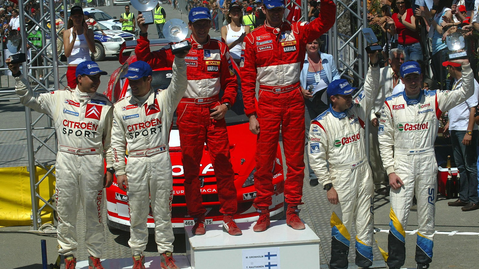 Cyprus Rally winners, Marcus Gronholm and Timo Rautiainen on the podium with Sebastian Loeb and Dani