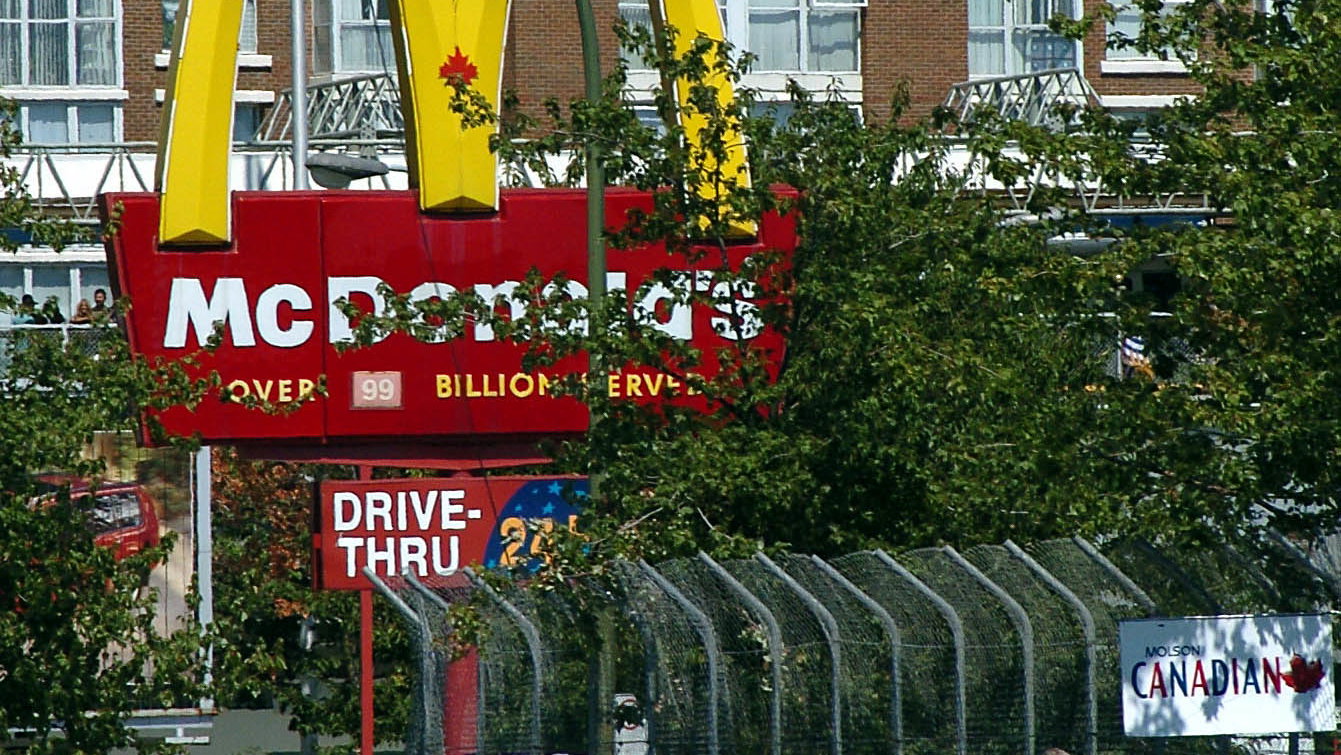 Sebastien Bourdais does some free promotional work for McDonalds in Vancouver