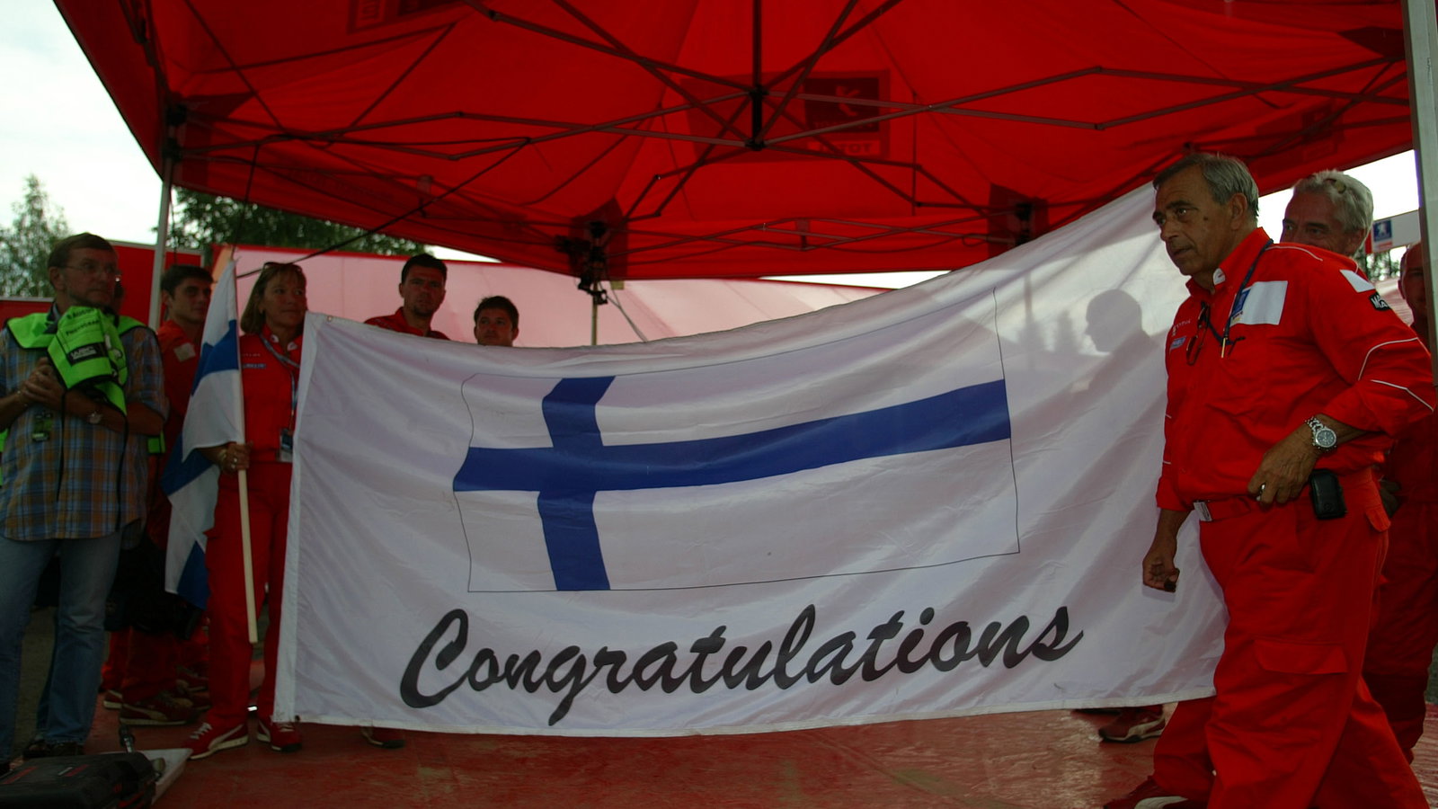 Corrado Provera, Peugeot Sport team principal and director,
celebrate in Finland