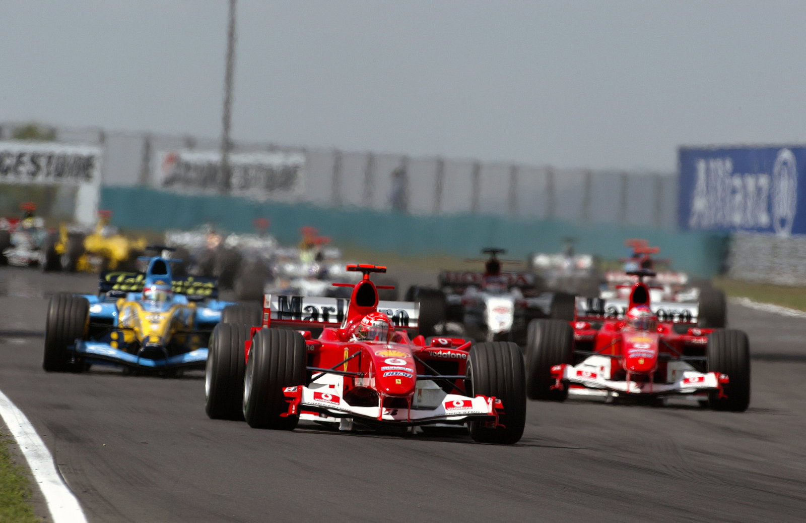 Michael Schumacher, Ferrari leads at the start of the Hungarian GP