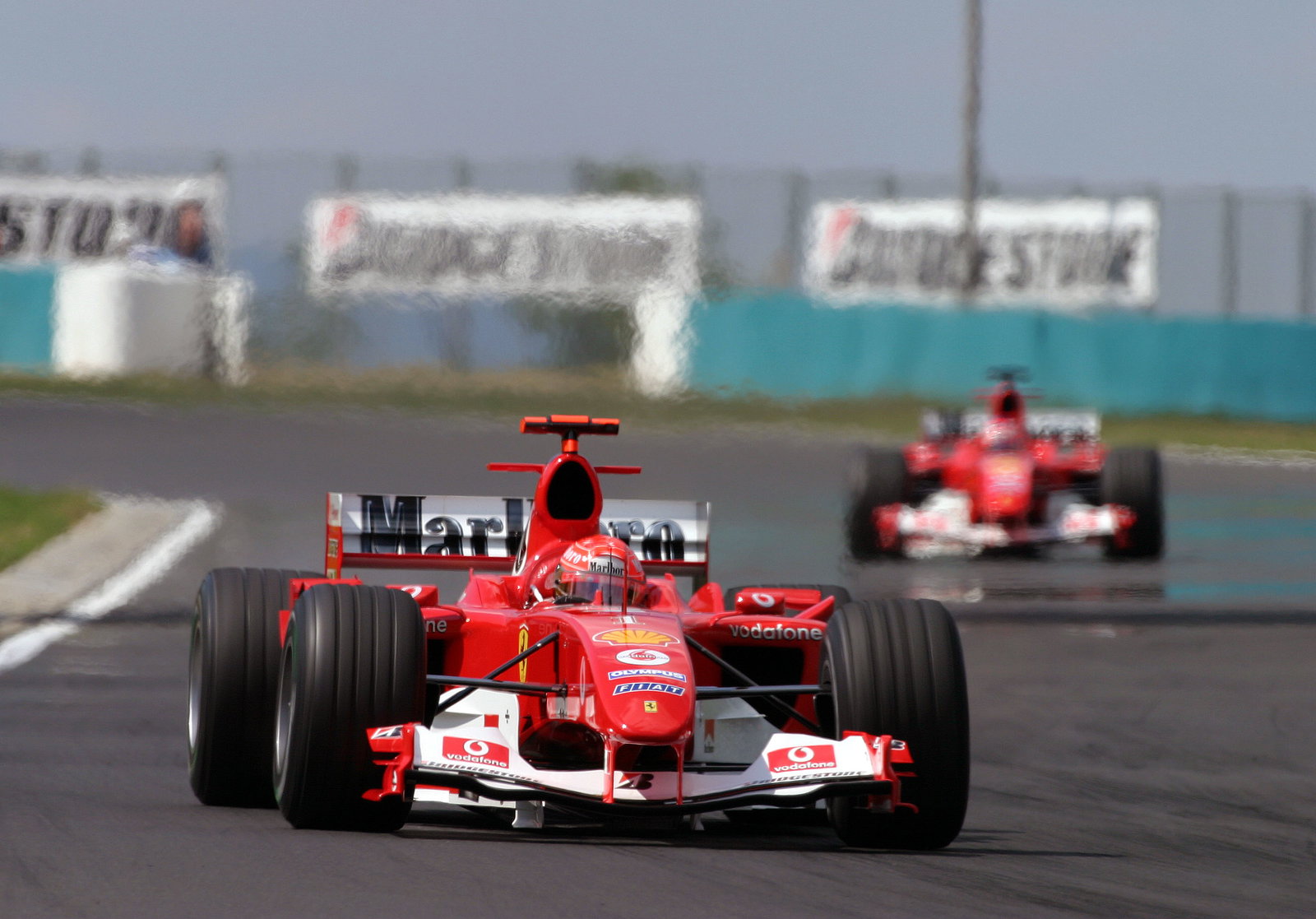 Michael Schumacher leads his Ferrari team mate
Rubens Barrichello