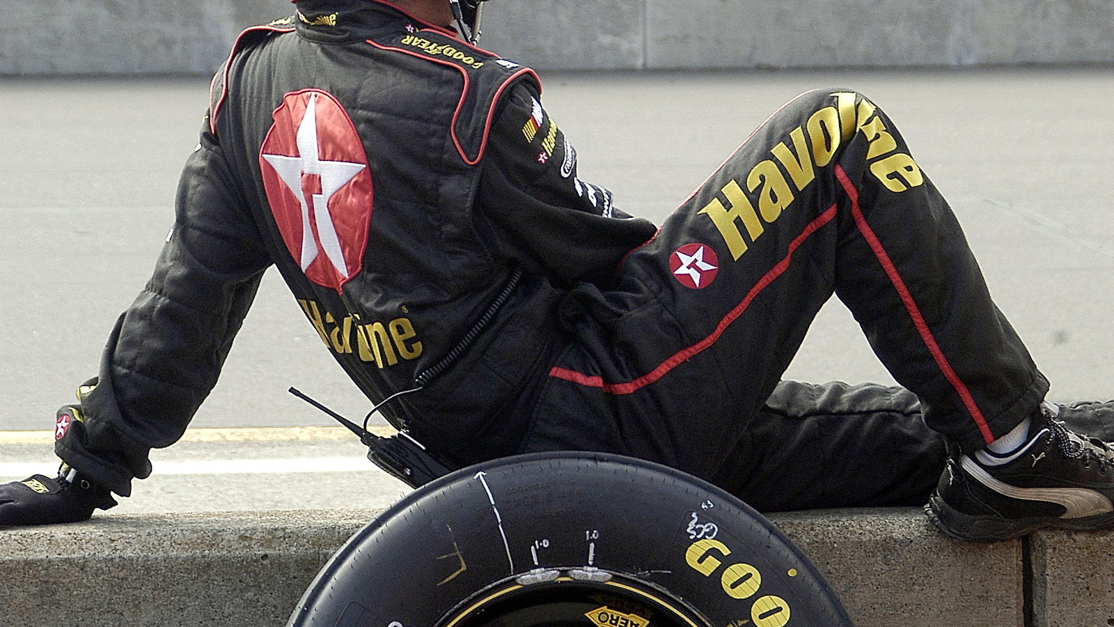 One of Jamie McMurray`s crew members waits on pit road at Watkins Glen.