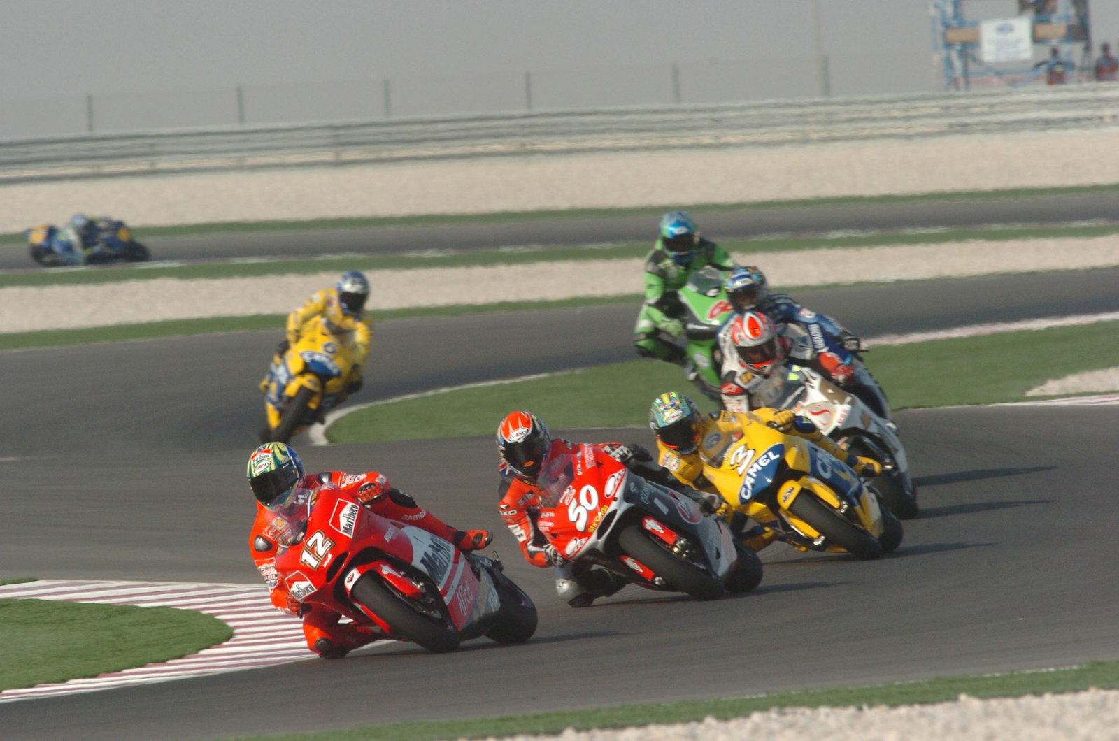 Bayliss, Hodgson, Biaggi, McWilliams et alQatar MotoGP, 2004